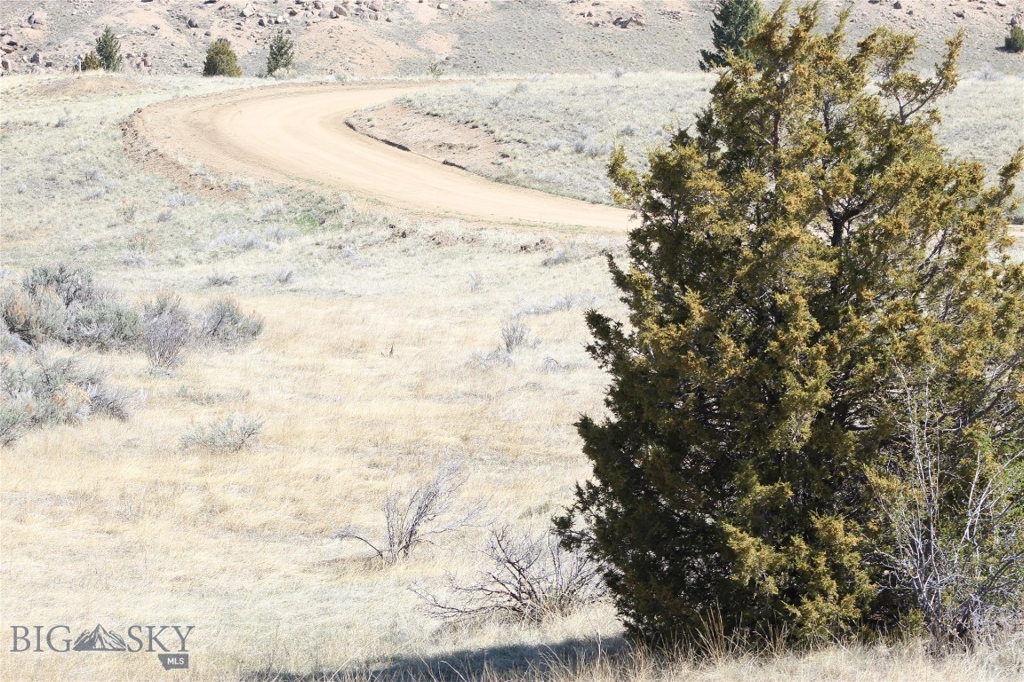 Step into the story of Butte’s past while seizing the opportunity of its future. Nestled just minutes from the heart of town, this expansive 20.613-acre parcel—tied to the historic Burgomaster #9112 mining claim—offers a rare chance to own a piece of Montana’s legendary mining legacy, while capitalizing on its incredible development potential.
Set against the breathtaking backdrop of the Pintler Mountains, this land is rich in both history and promise. Once part of Butte’s mining boom, where fortunes were forged and communities built from the ground up, this property is now ready for its next chapter. With recently placed corner pins and a thoughtfully laid-out infrastructure plan, it’s primed and ready to go.
Every five-acre section of the property has city water access, making it ideal for phased development or spacious private living. A fire hydrant has already been installed in the center five-acre segment—an invaluable safety asset for any builder or investor. Electricity is conveniently located within two miles, further simplifying the path toward development.
The terrain rolls gently with a mix of level and hillside topography, offering endless potential for custom homes, a private estate, or even a small-scale community plan. Whether you're drawn to the legacy beneath your feet or the mountain views above, this land invites you to dream big.
Don’t miss this incredible opportunity to own land that’s as functional as it is meaningful—where city utility meets rugged Montana beauty, and where history isn’t just remembered… it’s built upon.
Buyer(s), and Buyer(s) agent to perform all necessary due diligence to buyer(s) satisfaction.