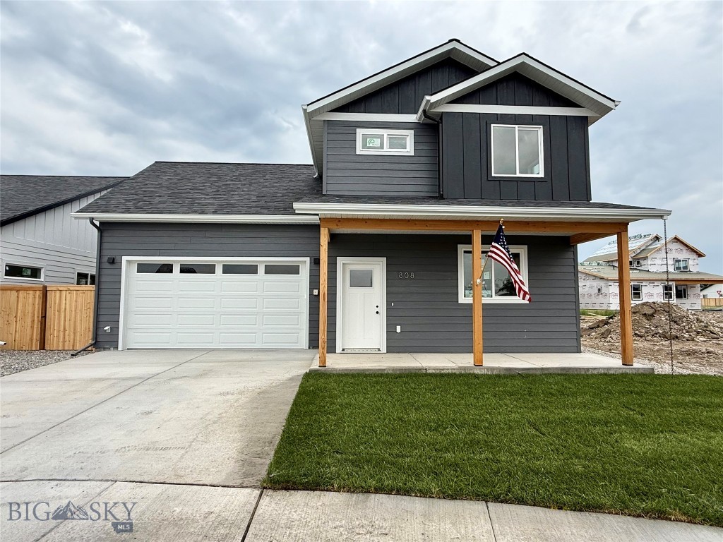 Welcome to Bridger Homes MT—crafted with exceptional attention to detail and designed for modern living. This thoughtfully planned residence offers spacious open-concept living on the main floor with 9ft ceilings, a convenient half bath, and a stunning kitchen featuring a large island, dining area, abundant cabinetry, under-cabinet lighting, and 3cm quartz countertops. Stay connected with fiber optic wiring throughout for ultra-fast internet and seamless streaming. Upstairs, enjoy a dedicated laundry room, four bedrooms, a full bath, and a luxurious primary suite with an ensuite bath featuring a full tile shower, and walk-in closet. This plan offers a 25' deep garage that is fully insulated and painted. The garage includes an 8ft door, extra storage, and a side man-door for easy yard access. Don’t miss this move-in-ready home blending style, function, and convenience! All interior photos are of the same model home that is staged.
