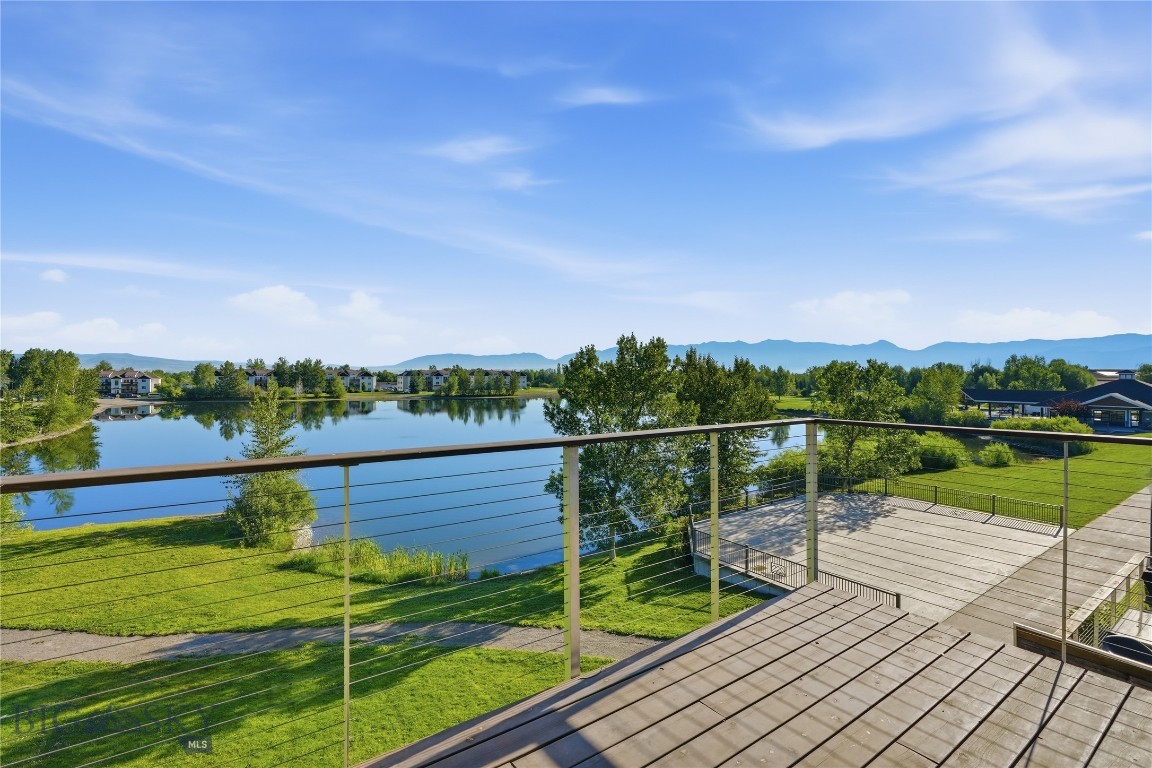 Welcome to 129 Village Unit #301A, a bright and low-maintenance 2 bedroom, 1 bath condo on the third floor of the Waterside Building in River Rock Village, with an HOA that covers all utilities. At 1,016 square feet, this beautifully maintained unit offers mountain and pond views right from your private balcony, a peaceful backdrop that's hard to find this close to everything Belgrade has to offer. 

The building recently received a new roof and new siding, adding long-term value and peace of mind for owners. Inside, you'll find a functional layout with a dedicated dining area, kitchen, and in-unit laundry featuring a new washer and dryer, along with central air, a full appliance package including dishwasher, disposal, and refrigerator, and added peace of mind from a fire sprinkler system and security system.

The location is hard to beat. River Rock Village sits within close distance to local commerce, scenic trails, and Ridgeview Elementary School, all set within a community built around a pond, sidewalks, and an established trail system.

One of the biggest perks here is the HOA, which covers all utilities along with exterior maintenance, garbage, insurance, lawn care, road maintenance, snow removal, and park and trail maintenance. That's about as close to worry-free condo living as it gets.

Whether you're looking for a low-maintenance primary residence, a lock-and-leave option, or an investment opportunity in a well-established community, this condo is worth a closer look!