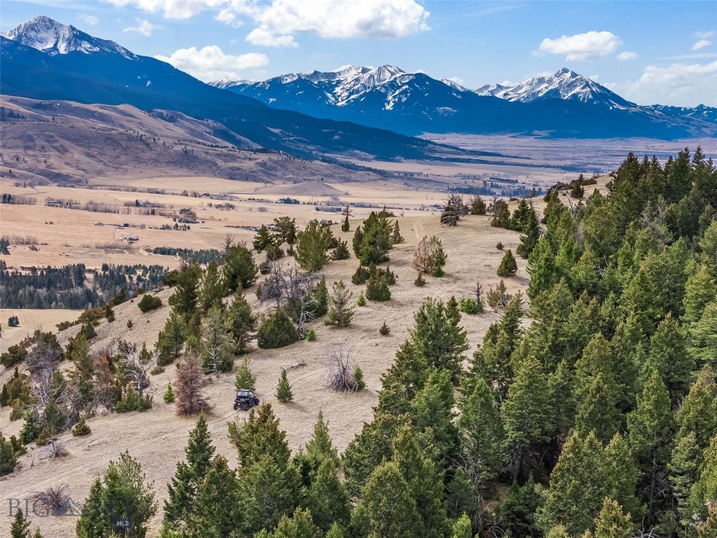 Paradise Valley 76.55-acre property with a hard-to-find blend of privacy, views, and convenience. Located about 10+/- minutes south of Livingston with easy access to I-90, this parcel sits back off the main road, offering a quiet setting with wide-open, unobstructed views. Positioned at the base of the Absaroka Mountains, you’ll get strong scenery in every direction.

A 4x4 trail winds up through the timbered hillside to the top of the property, where the views open up to a full sweep of Paradise Valley—an ideal spot to take it all in. Just up the road, the Suce Creek trailhead provides public access to thousands of acres of National Forest, and the Yellowstone River is close by for some of the area’s best fly fishing.

Local favorites like Pine Creek, Sage Lodge, Chico Hot Springs, and the Old Saloon are all nearby. Yellowstone National Park and Bozeman are both within about 45 minutes, making this a highly usable location whether you’re looking for recreation, a basecamp, or a homesite. Don’t miss this opportunity to own a piece of iconic Paradise Valley—call today for more information! (Make sure to click on the virtual tour link for the aerial video)