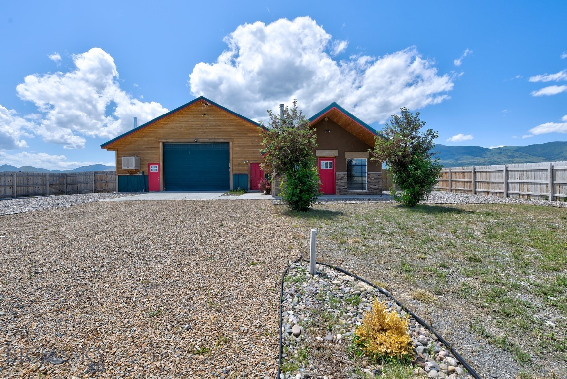 Here is your chance a great investment property with No covenants or zoning! Just North of Townsend with great views of Canyon Ferry lake across the Highway and the Mountains on both sides. The property currently has a commercial shop fronting US Highway 12 which has a daily traffic count of over 6500 vehicles per day.  Possibilities for this property are endless with various uses including but not limited to subdividing into residential or commercial lots, family transfers, commercial property with 10 acres or converting the existing shop into a shop house or barndominium.  All of this is less than 10 minutes to Townsend and less than 30 minutes to Helena.