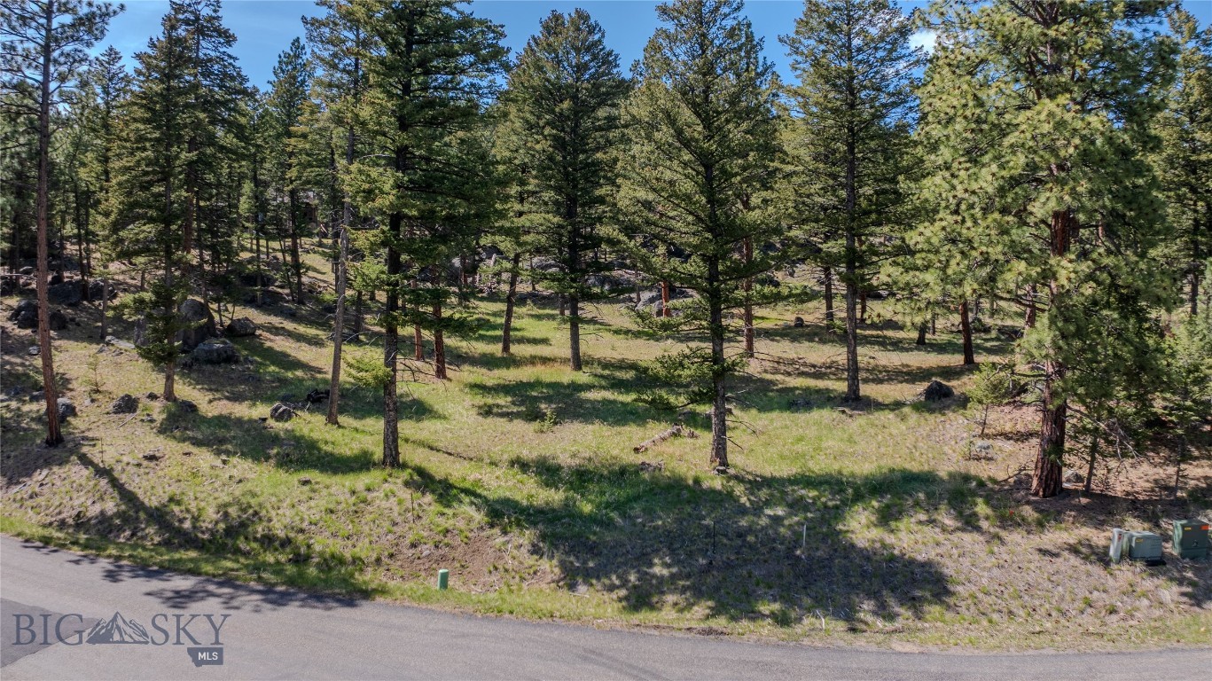 A rare and elevated offering in Jack Mountain Estates and BORDERING PUBLIC LANDS—just over 3 pristine acres where Montana’s natural beauty takes center stage. This park-like parcel is thoughtfully dotted with aspens and pines, opening to sweeping views that stretch beyond the horizon.
With a premier building site  , the property offers a unique blend of privacy, space, and immediate access to the outdoors. Whether you envision a modern mountain retreat or a legacy home under the Big Sky, this setting delivers both inspiration and possibility.
Opportunities like this are increasingly hard to find.