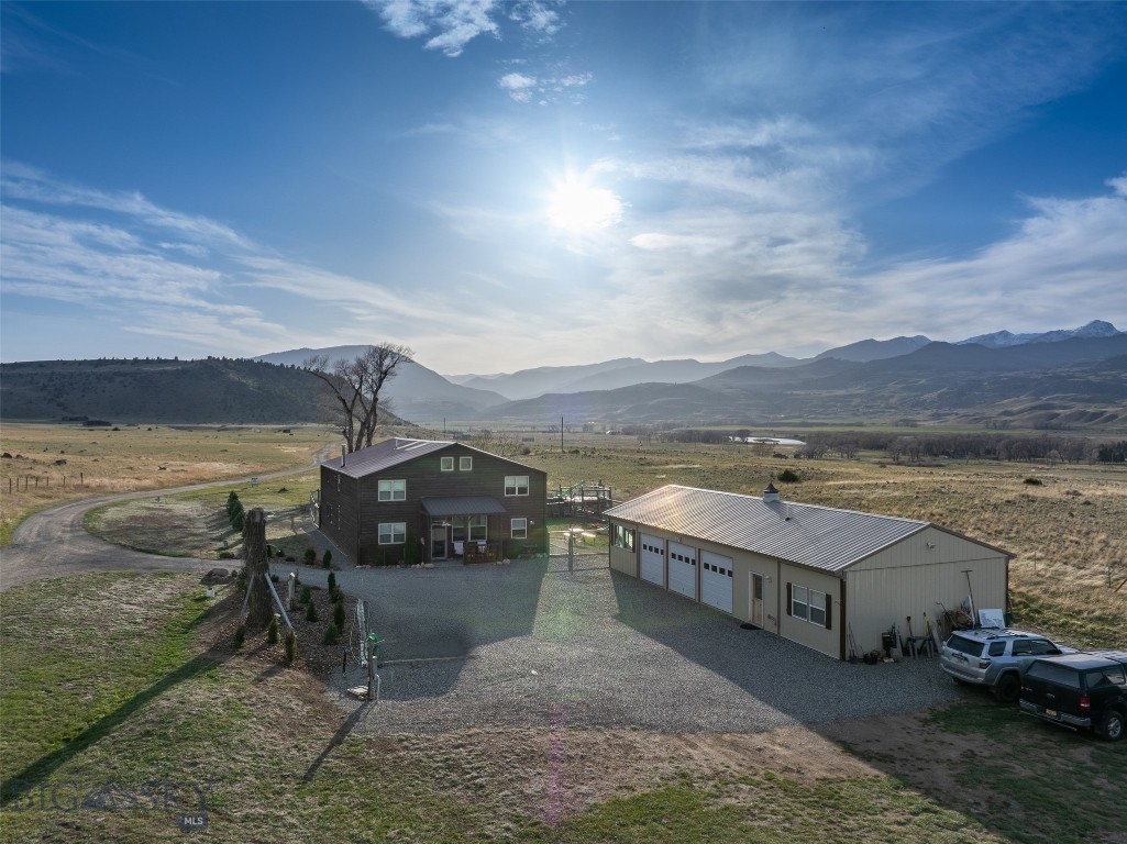 Discover the ultimate sportsman's retreat in iconic Paradise Valley! This exceptional 20.97 acre property in Pray, MT, places you in the heart of Montana's premier outdoor playground, with breathtaking panoramic views of the Absaroka Mountains and frequent visits from elk and deer.
World-class fly fishing await with private shared access to the legendary Yellowstone River; renowned blue-ribbon trout waters just moments away. Abundant big-game hunting opportunities abound on the property and nearby National Forest Service, BMA, State, BLM & RMEF lands. Only 30 minutes to Yellowstone National Park's north entrance (the park's only year-round access) for geysers, geothermal wonders, and epic adventures. Nearby Chico Hot Springs offers relaxing soaks, Livingston (25 minutes north) provides charming amenities, and Bozeman & Int'l airport is an easy hour drive. Dailey Lake, Cooke City (Snowmobile & Back Country Skiing Destination) and more recreation options are all within reach. Live the true Montana outdoor lifestyle!
Deeded covenants allow for an additional primary residence and two guest houses, opening incredible development potential on this private, lightly covenanted land (no HOA). Bring your horses and animals to the fenced corral, outbuildings, and greenhouse. Water rights for seasonal irrigation or livestock included.
The existing 4,144 sq ft main home features a versatile duplex layout built with comfort and utility in mind—perfect for multi-generational living or hosting. Enjoy the large fenced yard with above-ground pool w/ deck, play areas, efficient heating, and long private driveway (mini bulldozer included for plowing). A separate 520 sq ft 1-bedroom caretaker/guest quarters (built 2022) with attached 3-car garage and insulated hot tub room provides independent living space.
With deeded rights to build more, this property offers tremendous opportunity: ideal for short-term rentals (STR), investment income, multi-family compound, or legacy estate. A rare gem combining privacy, views, recreation, and flexibility. Make sure to check out the LandID map available on the Clearwater Properties website for additional details. Schedule your private tour today!