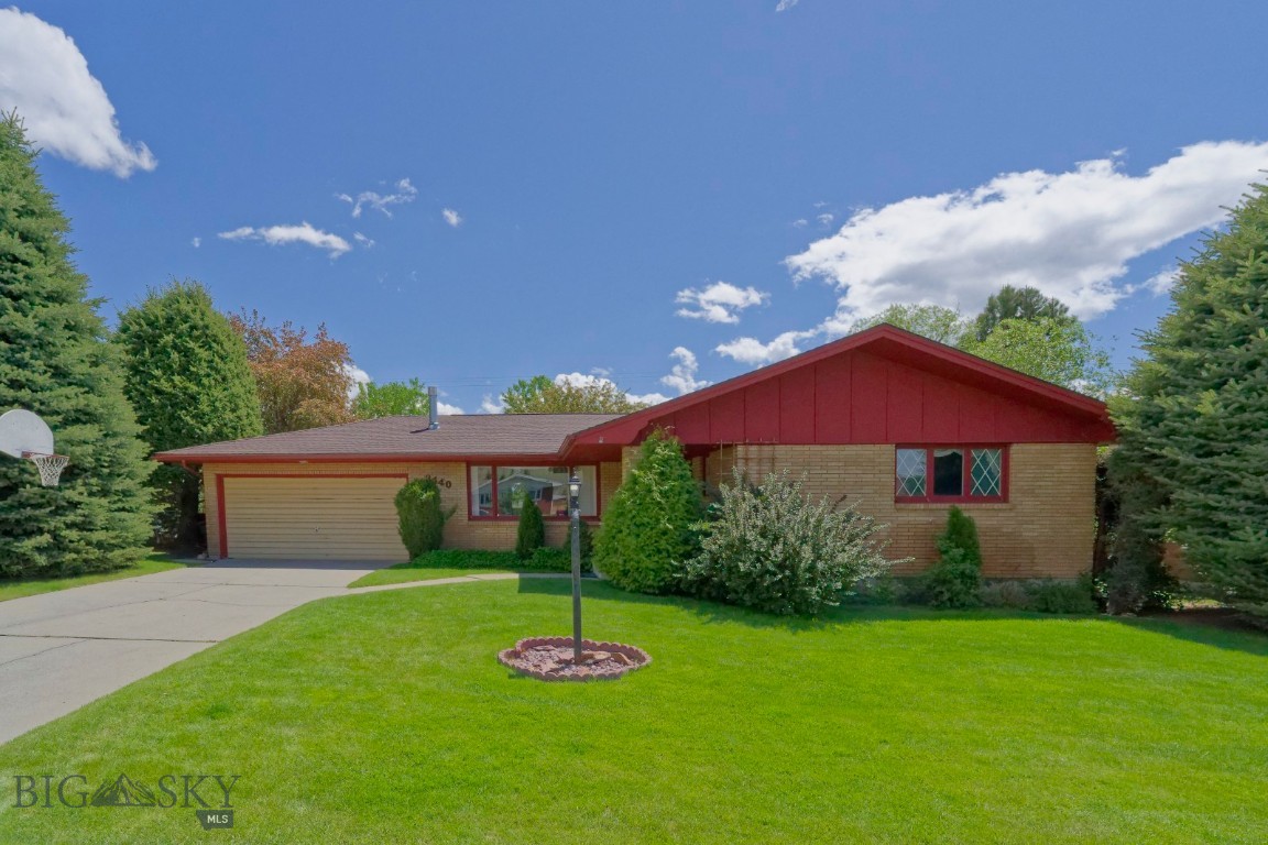 This property is a solid brick rancer in a strong neighborhood. It features an entry porch with seating and planters.  Entering the home  there is new flooring in the entryhall along with a coat closet. The living room is large and has a fireplace with gas insert along with an l-shaped extension for formal dining. Kitchen updates include granite countertops and it has additional table and seating. On the main floor are two bedrooms plus a primary bedroom with a primary bath and main floor bath. The lower level features a large family room with wet bar and extended workout room. Other rooms are two additional "nonconforming" bonus rooms. A large bathroom with laundry completes this area.  An upper level Trex deck with redwood railings provides spacious outdoor living space and is accessed through the garage which is a spacious two car. The landscaped yard has a water feature and mature landscaping with 8500 sq ft.