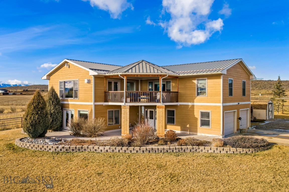 WILSALL BEAUTY!  This exceptional 20-acre horse property offers the perfect balance of privacy, space and accessibility. Located in Wilsall, a scenic 45-minute drive from Bozeman or neighboring Livingston, this residence features a seasonal pond, a well-equipped barn, riding arena and an impressive 6+ bedroom, 3 bathroom home ideal for large households, entertaining, or multigenerational living. Enjoy unequaled Montana views of the Absarokee, Bridger and Crazy Mountain ranges from every room.  Numerous windows allow for not only an abundance of sunlight but also a seamless connection to nature.  Flexible space offers privacy for up to 7 bedrooms (one non-conforming) and 3 full bathrooms with the ensuite having been recently updated with tasteful features such as floor-to-ceiling tile, glass doors and a double vanity.  This vast floor plan allows for multiple living areas, entertainment space with bar, a well-appointed kitchen and outstanding dining area able to accommodate large furniture pieces. But really . . . the outdoors are the main attraction with a covered deck with gas line for BBQ/fireplace, lower covered patio, garden space, fire pit, storage shed, automatic sprinklers, continuous pipe fencing, cement parking apron and well-maintained lawn & landscaping.  Equestrians will appreciate a new 36x48 insulated barn with 10 ft lean-to, dedicated tack and vet/feed room. Modular stalls can provide room for 4 horses or allow a larger space for foaling.  Separate entrances from each allow for easy transfer to outdoor stalls or corrals.  Plus your 100x100 foot riding arena provides for safe, consistent footing while exercising or training your horses.  Fully fenced and cross fenced offering 5 pastures, a natural seasonal spring and livestock well will ensure your animals are well provided. A secondary driveway to barn gives the space to maneuver or park large vehicles and multiple trailers. You can see the pride these homeowners have taken with this immaculate property.  Fall in love with our historic ranching community of Wilsall / Clyde Park while staying within easy reach of Bozeman’s shopping, dining, airport and world-class outdoor recreation.  If you’ve been searching for a horse property, home with acreage and a barn, or a private equestrian estate in Montana, this is a rare opportunity you won’t want to miss! Watch the full 3D video tour to experience everything this remarkable property has to offer and then arrange for your private showing today!