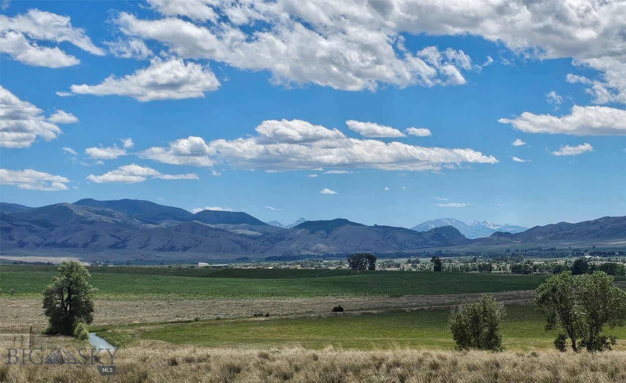 Five Mountain Ranges, 30.077 Acres, One Exceptional Property!!
Enjoy sweeping mountain views, privacy, and plenty of space for your horses on this beautiful 30.077-acre parcel. Conveniently accessed by a county-maintained road, the property is subject to reasonable covenants designed to protect your investment while preserving the area's rural character.
A productive 20 GPM well is already in place. A seasonal ditch borders the western property line, adding to the natural appeal of the land.  
Outdoor enthusiasts will appreciate the property's proximity to the Tobacco Root Mountains, Ruby Mountains, and the Ruby River, offering endless opportunities for fishing, hiking, horseback riding, hunting, and year-round recreation.
Don't miss this opportunity to build your Montana dream home in a scenic and desirable location.