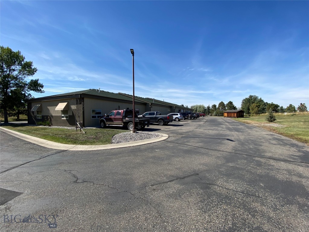 Great flex space with open office, two private offices, a break area and shop space with overhead door (10' high) and man door.
