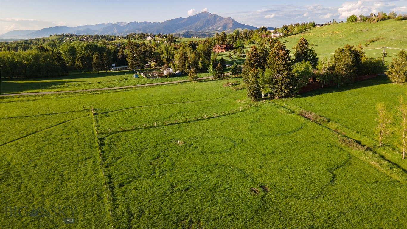 SELLER FINANCING AVAILABLE | NO COVENANTS | DEVELOPMENT POTENTIAL Over 4 lush acres in south Bozeman with complete building freedom and possible development opportunities (buyer to verify with Gallatin County). This is the rare find that lets you build YOUR vision, YOUR way. Located less than 2.5 miles from downtown, MSU, and popular trails, with sweeping mountain views and stunning sunsets as your backdrop. Seller will include proposed engineering plans to help you hit the ground running. Properties offering this level of flexibility and location are incredibly rare in today's market.