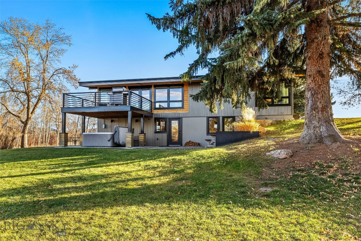 Welcome to your newly remodeled mountain-modern home, nestled in a peaceful forest cove with stunning mountain views. Step outside to fish the East Gallatin River, explore nearby trails, or stroll into town via the Main Street to the Mountains trail system—connecting you effortlessly to all that downtown Bozeman has to offer.
Set on 1.4 private acres adjoining a 49-acre Montana Fish & Wildlife park, this property is ideal for adventurers, nature lovers, and anyone seeking a serene Montana retreat. Originally built in 1959, the home underwent a complete, down-to-the-studs, high-end remodel in 2018 and is being sold furnished for a truly turnkey experience.
Inside, you’ll find 4 bedrooms, 2 bathrooms, a well-appointed kitchen, a spacious family room, and a versatile lower-level rec room. Take in Bridger Range views from the back deck and living room, or unwind in the outdoor hot tub. Additional panoramic vistas include Hyalite and the Spanish Peaks to the south.
With no covenants and current zoning that allows for additional dwellings, this property offers exceptional potential. All information is deemed reliable but not guaranteed. Buyers and agents are encouraged to conduct their own due diligence. Owner is a licensed real estate agent in the State of Montana.