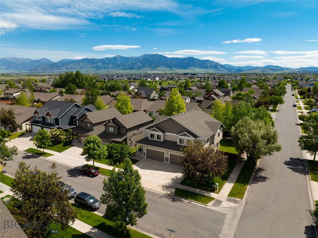 Discover the perfect blend of space, privacy, and turn-key convenience in Bozeman’s highly desirable Laurel Glen subdivision. This stunning, nearly 2,200-square-foot condo lives like a spacious single-family home while offering all the ease of condo living.

Step inside to find a freshly updated interior boasting brand-new carpet and paint. The main level invites you to unwind by the cozy gas fireplace, creating a warm and welcoming ambiance for Montana winters.

Key Features You’ll Love:
Expansive Living Space: Nearly 2,200 SF of thoughtfully designed interior.

Private Outdoor Oasis: Rare for condo living, enjoy your own spacious private backyard featuring beautiful, mature landscaping—perfect for summer BBQs, pets, or relaxing in the fresh air.

Fresh Updates: Move right in with peace of mind, thanks to newer paint inside and out, plus brand-new carpeting throughout.

Upper-Level Privacy: All four bedrooms are located upstairs, keeping your living and sleeping spaces beautifully separate.

Massive Primary Suite: A true retreat, the oversized primary bedroom features two large closets and plenty of room to stretch out.

Room for Everyone: Three additional upstairs bedrooms are served by a large, well-appointed guest bathroom.

Premium Bozeman Location
Situated in the sought-after Laurel Glen neighborhood, you are just steps away from vibrant local parks and scenic walking trails. Enjoy the best of Bozeman’s outdoor lifestyle right outside your front door, all while being just minutes from shopping, dining, and top-rated schools.