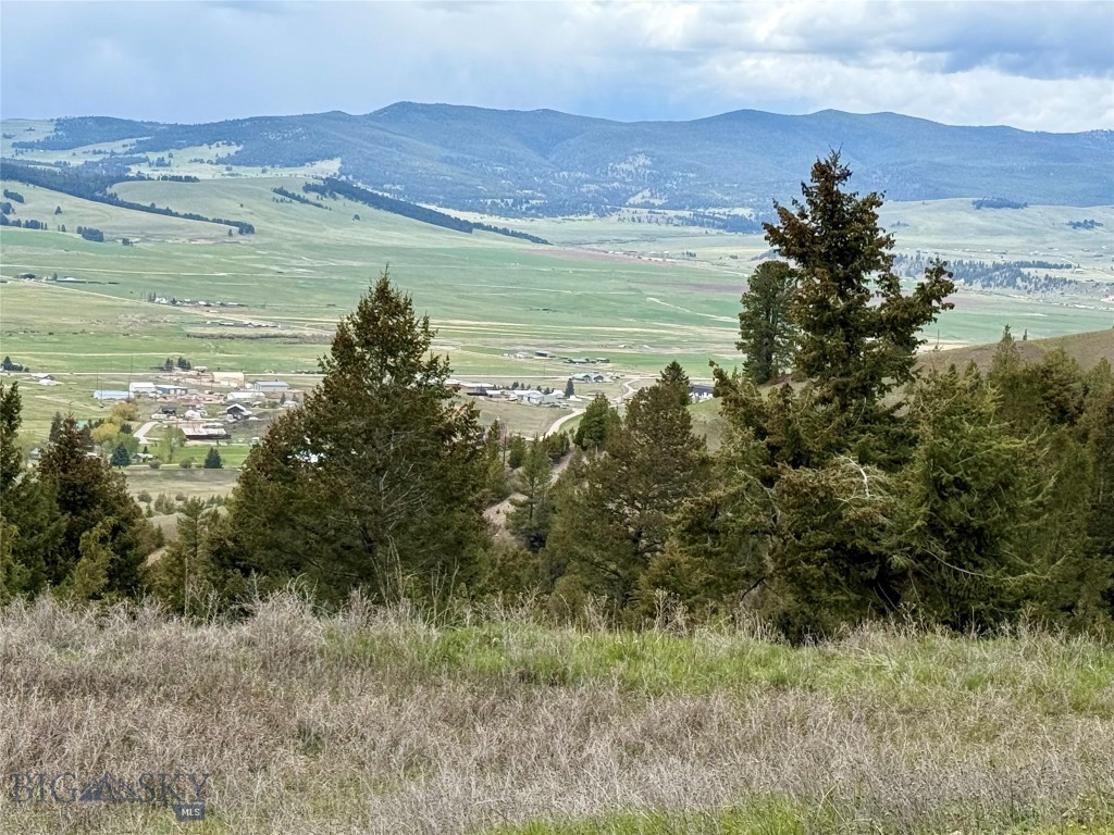 Own a piece of the world famous Granite Mountain. 28 acre parcel with 2 separate deeds *NO covenants* Approx one mile from Historic Downtown Philipsburg. The property has direct burial electrical to the lot, permitted septic installed (unfinished), a well (no pump), waterline, building site, gravel road to homesite, and a 36x48 foundation in place. Less than a quarter mile off of the Granite road turn off, allowing easy access. Incredible views overlooking Flint Creek Valley and is certainly the crown jewel of Granite County.
