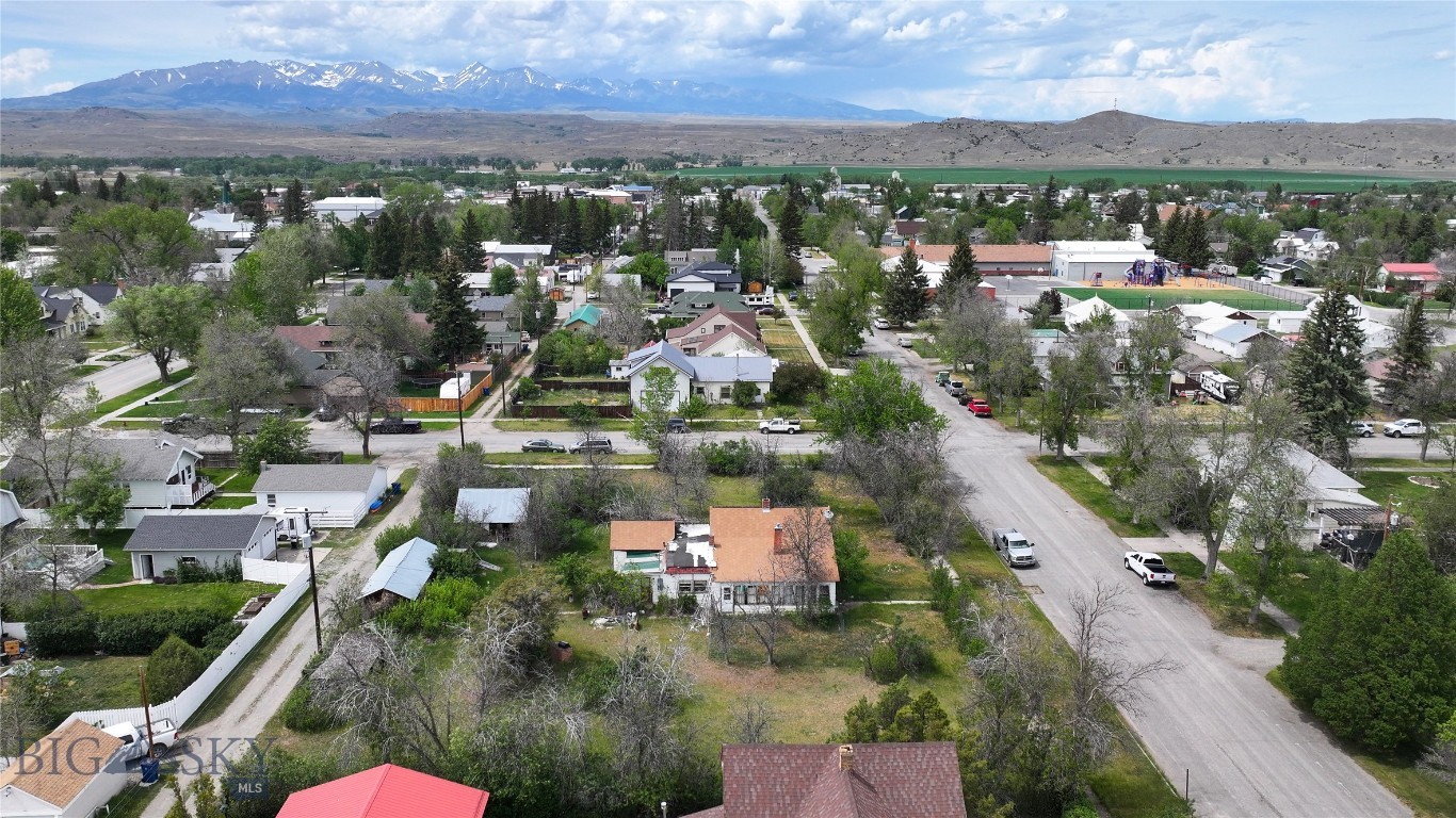 Multi-Lot Residential Development Opportunity in Big Timber, Montana

Discover a rare opportunity to own a sizeable in-town development parcel in the growing community of Big Timber, Montana. Zoned R-1 Residential Low Density District, the property is well-suited for a variety of residential uses and presents the unique opportunity to develop up to three residential homes, making it an attractive investment for builders, developers, or those seeking to create a family compound. Permitted uses within the R-1 zoning district include: Single-family residences; Modular homes; Accessory buildings and accessory uses; Temporary buildings used during construction projects; Family day care homes; Home occupations, subject to applicable city regulations.

The property's generous size and multi-lot configuration provide ample room for thoughtful site planning, allowing for multiple residences, detached garages, shops, storage buildings, landscaped outdoor spaces, and other accessory improvements. With city utilities available and convenient access to schools, parks, shopping, and downtown Big Timber, the property is ideally positioned for both immediate development and long-term investment.

Whether you're a developer looking to capitalize on the demand for housing in Sweet Grass County, an investor seeking future appreciation potential, or an individual looking to build multiple homes for family or rental purposes, this property offers a combination of size, location, and development flexibility that is increasingly difficult to find.

Large residential parcels with the potential for multiple homes within Big Timber's city limits are exceptionally rare. Bring your vision and take advantage of this unique opportunity to create something special in one of Montana's most desirable small-town communities.