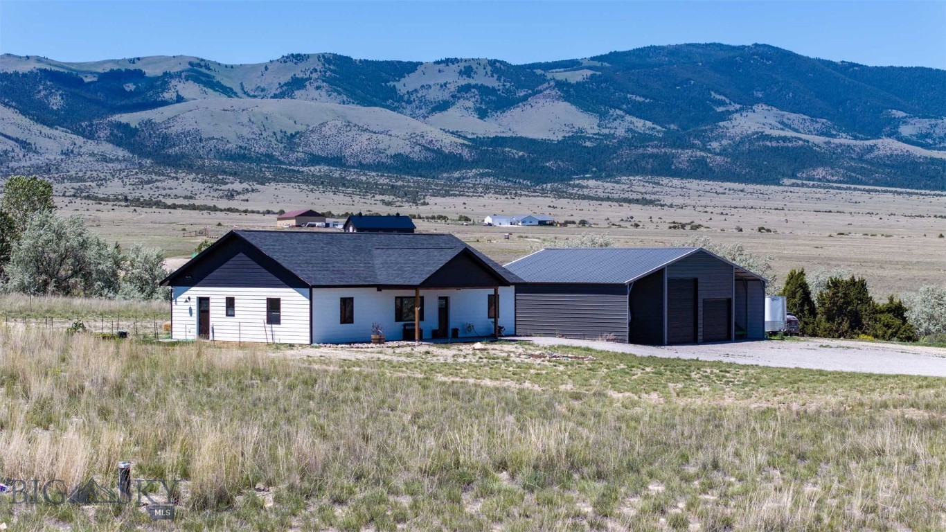 Built in 2024, this beautiful 3-bedroom, 2-bathroom home offers 1,500 sq. ft. of main-level living with 360-degree views of Canyon Ferry Lake and the Elkhorn Mountains. The home features an open-concept layout with vaulted ceilings, solid surface countertops, and radiant floor heat.

The 4.31-acre property is situated on the banks of Warm Springs Creek and includes a heated, insulated shop with lean-tos on either side for additional storage. It is conveniently located just minutes from Townsend and 25 minutes from East Helena, providing easy access to local amenities and endless recreational opportunities.

Schedule a showing today.