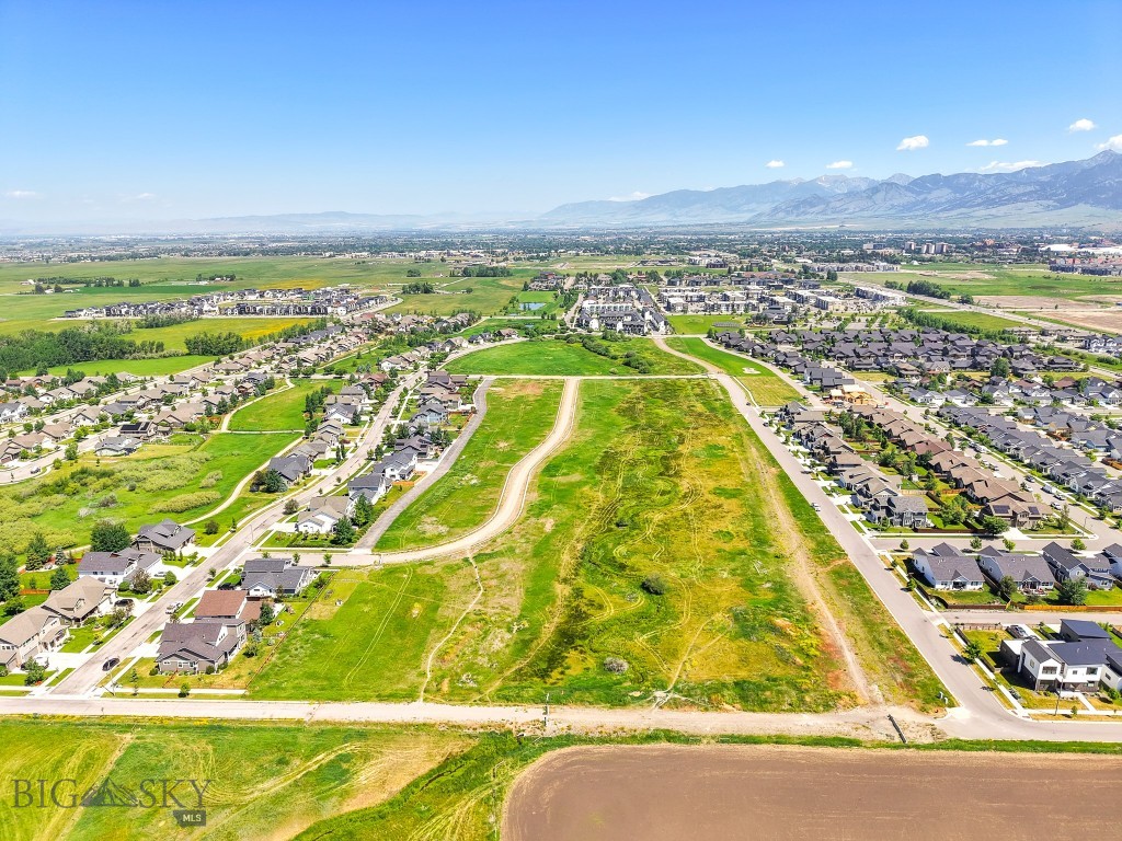 Welcome to Meadow Bridge, Bozeman’s newest premier neighborhood located on the highly desirable south side of Bozeman. This thoughtfully planned subdivision features 45 fully entitled homesites ranging from approximately 4,000 to 14,000 square feet—offering the perfect setting to bring your custom dream home to life.

Meadow Bridge is also one of the last remaining subdivisions within the city limits dedicated exclusively to single-family homes, making it a rare opportunity for those seeking a traditional neighborhood setting without multi-family development.

Residents will enjoy beautiful views of the Bridger Mountains, a well-designed neighborhood setting, and convenient access to nearby parks, open space, and walking trails. The community is ideally located just minutes from historic downtown Bozeman, with easy access to dining, shopping, recreation, top-rated schools, and Montana State University.

This particular homesite is one of the cozier lots in the subdivision and offers convenient access to nearby open space and a community trail, making it easy to step outside and enjoy the outdoors. The lot still provides plenty of opportunity to design a thoughtfully planned home that suits your lifestyle—whether you envision a modern farmhouse, a charming cottage, or a well-designed two-story home.

Bring your builder and start planning your future in Meadow Bridge—where the comfort of a close-knit neighborhood meets the convenience and beauty of living in Bozeman.