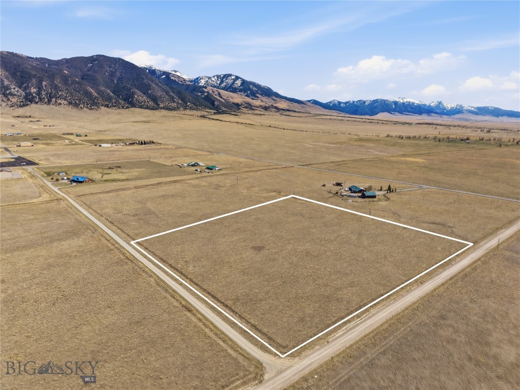 Discover a rare opportunity to own a stunning 10-acre parcel in the exclusive Ennis, MT Airport Subdivision—where aviation enthusiasts can build their dream home and shop. Just minutes from the charming western town of Ennis, this property blends convenience with wide-open Montana skies. Whether you're drawn by the freedom of aviation, the lure of world-class fly fishing on the Madison River, or the proximity to some of the West's most iconic destinations—like Big Sky Resort and Yellowstone National Park—this location offers it all. Enjoy panoramic mountain views, endless outdoor adventure, and the unique lifestyle only a Montana airpark community can provide. This is more than just land—it's a launchpad for the life you've been dreaming of. Seller is a Licensed Montana Real Estate Agent. Property has a new Well!