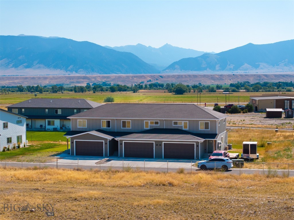 Investor Alert: Rare New-Build Triplex in the Heart of Ennis, Montana – High-Demand Rental Market with Exceptional Features.

This is a unique opportunity to own a newly constructed (2023) triplex in the fast-growing and highly desirable town of Ennis, Montana—just minutes from downtown and the world-renowned Madison River. With low inventory and high demand for quality rentals in the area, this turnkey investment is positioned to deliver strong, reliable cash flow from day one.

Each of the three spacious units offers a 3-bedroom, 2.5-bathroom layout across two well-designed stories. Tenants enjoy open-concept living on the main floor—featuring a welcoming living room, modern kitchen, guest half-bath, and laundry—while all bedrooms and full baths are privately located upstairs. These units are among the largest available rentals in Ennis.

What truly sets this property apart for investors is the rare combination of large garages and abundant off-street parking—a major draw for long-term tenants and outdoor enthusiasts with trucks, boats, trailers, or recreational gear. These features significantly boost rental appeal and allow you to command premium rental rates compared to standard multifamily properties.

Additional high-value amenities include central A/C, fully sodded lawns, and an underground sprinkler system, making this a low-maintenance, high-performing asset.

With Ennis growing in popularity among both locals and remote workers seeking small-town charm and big recreation, this property offers excellent long-term upside and immediate income potential. Whether you’re expanding your portfolio or entering a stable, high-demand market, this triplex checks every box for a smart investment.