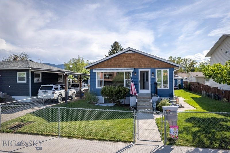 Look at the curb appeal of this Livingston cutie!  Meticulously maintained 4 bed, 3 bath home within walking distance of downtown Livingston, groceries, schools, parks and the Yellowstone river.  Current owners had a brand new roof placed in May of 2026.  Home is set up for dual living with complete living spaces on both the main level and the basement, with all appliances included.  Basement windows are all egress.  Oversized detached shop has both electric and wood heat and is wired 220V.  It also has a sweet little sun room off the front to enjoy the side yard under protection.  Yard has dual fences in order to be able to be split and offers off street parking from the alley access.  Come check out all this beautiful property has to offer!