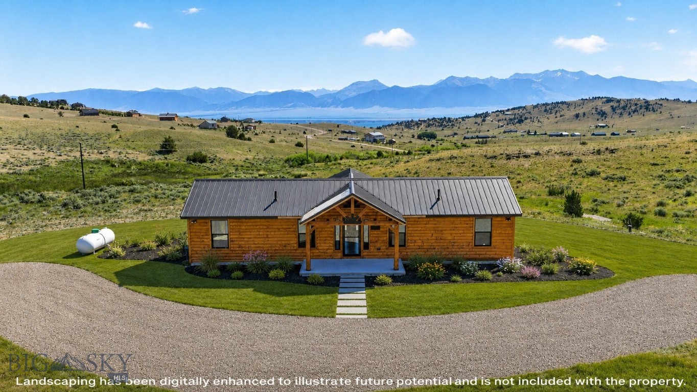 70 Dry Creek Trail – Meadowlark Cabin. Experience the best of Montana living at Meadowlark Cabin, a newly constructed mountain retreat in the Shining Mountains subdivision just minutes south of Ennis. Thoughtfully designed to capture breathtaking views of the Madison Range, this 2-bedroom, 2-bath home combines timeless mountain architecture with modern comfort and quality craftsmanship. The inviting exterior features log siding, a covered timber-framed front porch, and a standing seam metal roof.

Inside, soaring vaulted ceilings with exposed timber trusses, warm pine tongue-and-groove walls, live edge countertops, and expansive glass doors showcase the surrounding mountain views. The open-concept living area flows seamlessly into the kitchen with stainless steel appliances, creating an inviting space for entertaining or relaxing after a day outdoors. An electric fireplace adds warmth and ambiance, while an efficient mini-split system, propane wall heater, and electric wall heaters provide year-round comfort. The home is also pre-wired for a whole-house generator.

A unique feature of Meadowlark Cabin is the generous overhead storage above both bathrooms, accessed from each bedroom. These spacious areas provide valuable storage rarely found in a cabin of this size, making it easy to stow outdoor gear, seasonal items, and recreational equipment.

Built with efficiency and quality in mind, the cabin features extensive spray-foam insulation, a Navien on-demand propane water heater, hot and cold exterior water spigots, a strong-producing private well, and a one-year builder warranty.