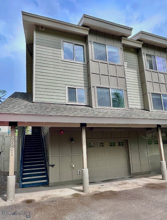 This well-located three-bedroom, two-and-a-half-bath condo offers a bright, comfortable layout across three levels and is ready to furnish and occupy, with fresh paint and new carpeting.  The drive-up level has the spacious heated garage with built-in shelving and an additional owner storage/mechanical room. Above that, the main living level offers the kitchen, dining area, living area with a covered patio and a convenient half bath.  All three of the bedrooms, two full bathrooms and a laundry area are on the top level, with the primary bedroom offering a private exterior balcony and an ensuite bathroom.  Morning Sun Condos are centrally located in the Meadow Village, with adjacent open space and a free winter shuttle stop within the development. The property is close to the golf course, area trails, groomed winter cross-country ski trails, Big Sky Community Park, Gallatin River activities, and the amenities of both Meadow Village and Town Center.  The location is approximately three minutes from the Lone Mountain Guest Ranch, 10-15 minutes from skiing and activities at the Big Sky Resort and 45 minutes from Yellowstone National Park.  With its quiet setting, convenient location, and fresh interior updates, this unfurnished condo with lower HOA dues, is a true gem in beautiful Big Sky.