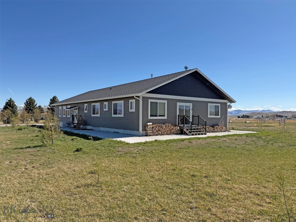 This highly desirable property is just minutes from Dillon and yet out in the country side where you can enjoy uninhibited views in every direction! You will never tire of the views of farmland, Beaverhead Rock, Pioneer, Ruby, Blacktail and Tobacco Root Mountain ranges and breath taking sunsets. Literally spot elk on Dutchmen and up Birch Creek in the Pioneer Mountains right from your living room! Over three irrigated acres with plenty of room to accommodate your country living life style. A well built, sturdy home finished in 2022 has 3 bedrooms 2 baths with attached, insulated garage. The garage has 1,600 square feet to keep your toys and vehicles safe from the elements. Efficient cove heaters keep the house toasty warm and you also can heat with the wood stove. In case of any outage this home boasts a propane generator to keep your mind at ease. All the details have been implemented into this house. This is the country escape you've been longing for with quick access to all of the amenities of Dillon. Call and set up a showing today!