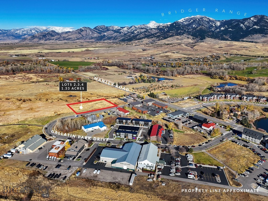 Lots 2, 3, and 4 in Gallatin Park present a rare opportunity to secure three adjacent M-1 (Light Manufacturing) parcels in North Bozeman’s active commercial corridor. Purchase individually or assemble all three for a larger footprint with scale flexibility.

Positioned on the north end of the development, the lots offer unobstructed Bridger Mountain views and immediate access to Manley Road, providing strong visibility and efficient connectivity. Gallatin Park is established with a diverse mix of live/work units, warehouse facilities, and operating businesses, creating built-in synergy and consistent commercial activity.

M-1 zoning allows for a wide range of light industrial, flex, storage, distribution, and business uses, offering adaptability for owner-users or developers seeking long-term appreciation in a growth-oriented submarket.
Located within Bozeman city limits with city water and sewer services in place. Conceptual plans for a live/work condo project spanning all three parcels are available upon request.

Strategic location, flexible zoning, and scalable configuration make this a strong acquisition in one of Bozeman’s expanding commercial districts.