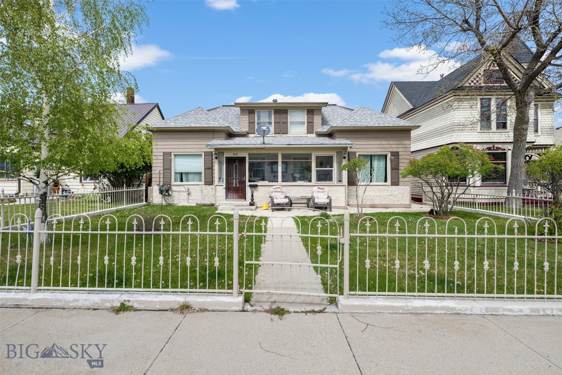Spacious and versatile 5-bedroom, 2-bath home situated on a generous 7,000 sq. ft. lot just blocks from the downtown area. This well-maintained property features the convenience of main-floor laundry, a fully fenced yard, and ample off-street parking. A standout feature is the two large detached garages, including one newly constructed garage offering excellent space for vehicles, storage, hobbies, or a workshop. With its flexible layout and multiple living spaces, this property makes an ideal primary residence for a growing family while also presenting excellent potential for conversion into a duplex for additional income opportunities. Enjoy the convenience of nearby downtown amenities while benefiting from the space, parking, and versatility this unique property has to offer. Make your appointment to view this exceptional property today!