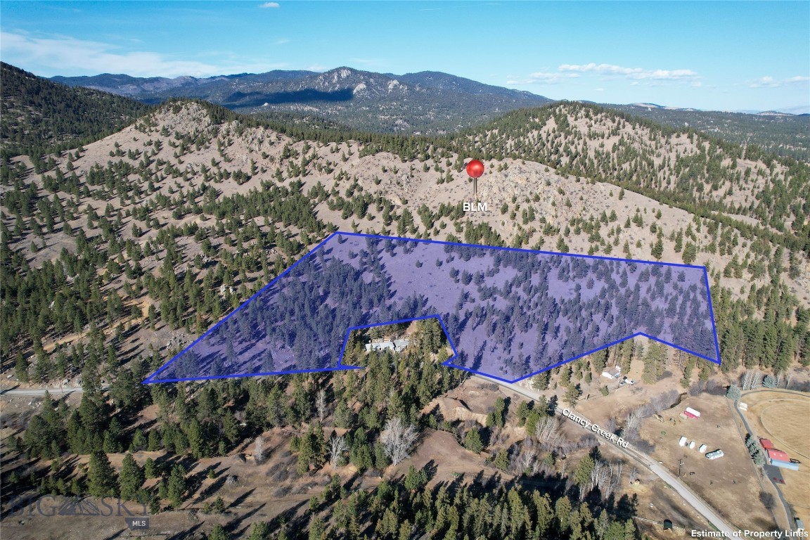 Approximately 14 acres bordering BLM land, offering endless opportunities for hiking, hunting, and enjoying the outdoors. This property is rich with wildlife, including elk, deer, turkeys, and more. Featuring a beautiful mix of trees and natural boulders, it provides excellent privacy and a true Montana feel. Ideal for a buyer looking to complete a family transfer or create space for future generations. Conveniently located with easy access to Clancy School and the interstate, combining seclusion with accessibility. Property is subject to a boundary line adjustment; final acreage, boundaries, and legal description to be determined by survey and subject to approval and recording prior to closing.
