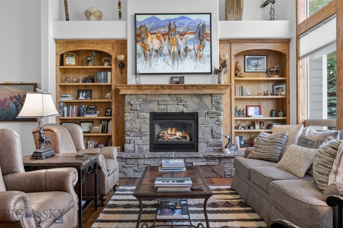 Welcome to Montana living at its finest. This rare offering on Bozeman’s sought-after south side is located in the desirable Sourdough Creek subdivision, where a tranquil year-round creek flows gracefully through the property.

Meticulously maintained, this beautifully appointed home offers approximately 3,800 square feet of living space and sits on a picturesque one-acre parcel surrounded by breathtaking scenery. As you enter the home, soaring 10-foot ceilings welcome you into the main living area, where vaulted ceilings and expansive windows showcase the peaceful natural setting.

Solid hardwood floors flow throughout the main level, complementing the home’s warm and inviting design. The spacious primary suite features a tile surround fireplace, a luxurious en-suite bathroom with dual vanities, a walk-in shower, and a large soaking tub designed for relaxation.

Exquisite finishes throughout the home include granite countertops, a stunning stone fireplace, and rough-sawn hardwood flooring. The west-facing back porch is the perfect place to enjoy the sounds of the creek and Montana’s cool summer evenings.

The second floor offers three additional bedrooms along with a flexible office or den space. Completing the property is a heated three-car garage, providing ample room for vehicles, storage, and recreation.

Only minutes from downtown Bozeman, yet far removed from the hustle and bustle of town, this property offers the perfect balance of convenience and serenity. Walking trails surround the area, with the popular Tuckerman Trail located nearby for year-round outdoor enjoyment.

Experience privacy, comfort, and timeless Montana elegance in one of Bozeman’s most coveted locations.