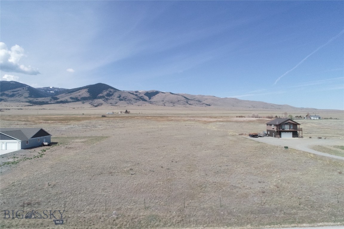 Discover this hard-to-find 1.4-acre tract at Canyon Ferry Reservoir, ready for your full-time residence or vacation home. Prime Location situated just outside of Townsend in the easily accessible area of the Silos at Canyon Ferry, this property offers an enviable location for your dream home. Imagine being just a short drive from your driveway to the Broadwater Bay boat launch, providing endless opportunities for fishing, boating, and water recreation. This property boasts excellent proximity to both Helena and Bozeman and close access to the mountains, trails and the Missouri River. You have ample space to build a beautiful home or even a stunning barn dominium, the possibilities are endless, allowing you to create a space that perfectly fits your lifestyle and aspirations. Domestic well already in place, breathtaking views and backing to county owned property provides a wonderful backdrop for your own space