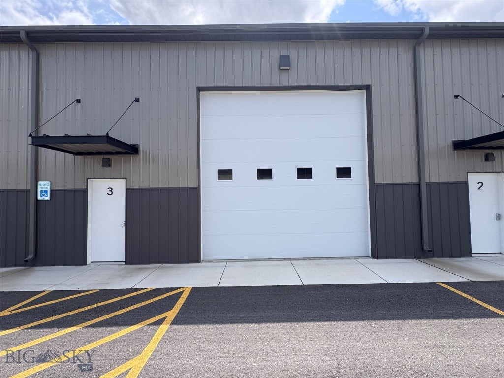 Position your business for success with this strategically located commercial warehouse in North Belgrade, just minutes from Bozeman Yellowstone International Airport (BZN), I-90, and the direct route to Big Sky. Whether you're expanding your operations, investing in commercial real estate, or searching for premium warehouse space near Bozeman, this property offers exceptional accessibility in one of Montana's fastest-growing commercial corridors. This modern commercial condo features a fully insulated and heated metal building with impressive 18-foot ceilings and an oversized 14' x 14' overhead garage door, providing the flexibility to accommodate a wide variety of commercial and industrial uses. Ideal for many uses, this versatile warehouse adapts to your business or personal storage needs. Designed with efficiency and low-maintenance ownership in mind, this property offers a practical solution for owner users and investors alike. With continued commercial growth throughout Belgrade and the greater Bozeman area, opportunities to own industrial warehouse space in this location are increasingly limited. Seller financing available! Additional creative financing and rent-to-own options are also available, making ownership more attainable in today's competitive Montana commercial real estate market. Don't miss this opportunity to own a high-quality warehouse in one of the region's most sought-after commercial locations, with easy access to Bozeman, Belgrade, Big Sky, Interstate 90, and Bozeman Yellowstone International Airport.