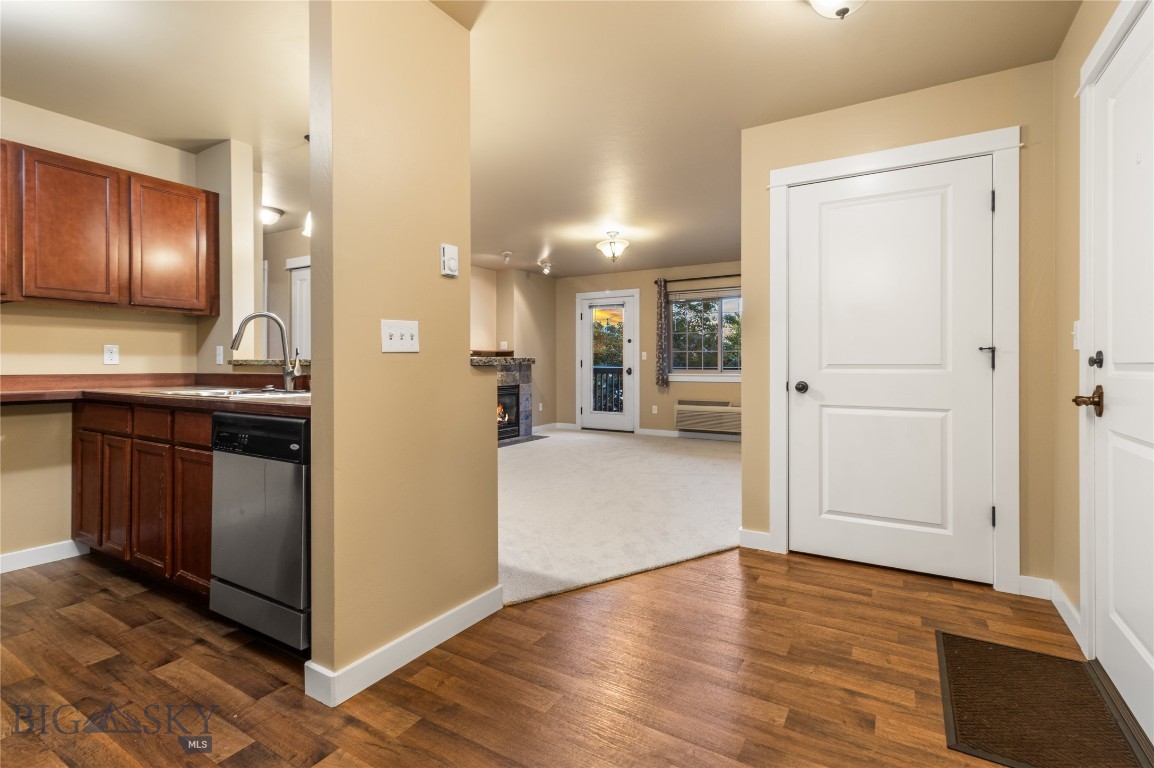 Settle into a lifestyle that blends comfort, convenience, and scenic Montana views at 4645 Bembrick 2B in the sought-after Bronzeleaf condos. This FHA-approved, air-conditioned second-floor home offers 1002 sq ft with 2 bedrooms, 2 baths, a fresh coat of paint, new carpet, and an open, seamless design that connects the kitchen, living area, and covered deck for easy everyday living. The inviting living room features a cozy gas fireplace and opens to a private covered deck with the best views in the complex, while the quiet setting offers added privacy away from busy roads and parking-lot views. The primary suite includes a private bath, and the second bedroom with an additional full bath provides flexible space for guests, work, or hobbies. Enjoy the nearby neighborhood park, beautiful lake, scenic trail system, and on-site exercise room, along with 2 covered parking spaces and storage closets located directly across from the association gym. With schools, open space, parks, and Ferguson Farm’s shopping, dining, and entertainment just about a mile away, this move-in-ready condo offers an appealing blend of location, views, and low-maintenance living. Schedule a showing today!