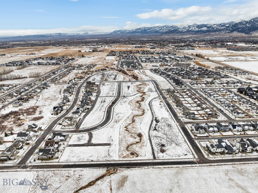 Welcome to Meadow Bridge, Bozeman’s newest premier neighborhood on the desirable south side. This thoughtfully planned subdivision features 45 fully entitled homesites, ranging from approximately 4,000 to 14,000 square feet—perfect for bringing your custom dream home to life. Enjoy breathtaking views of the Bridger Mountains, enhanced privacy, and direct access to open space and nearby parks. Ideally located just minutes from historic Downtown Bozeman, Meadow Bridge offers convenient access to dining, shopping, recreation, top-rated schools, and Montana State University. This is a rare opportunity to build in a quiet, close-knit community while still enjoying all the amenities Bozeman has to offer. With generous lot sizes and flexible design options, you have the freedom to create a home that fits your lifestyle—whether you envision a modern farmhouse, a charming cottage, or a thoughtfully designed two-story home. Bring your builder and turn your vision into reality at Meadow Bridge.