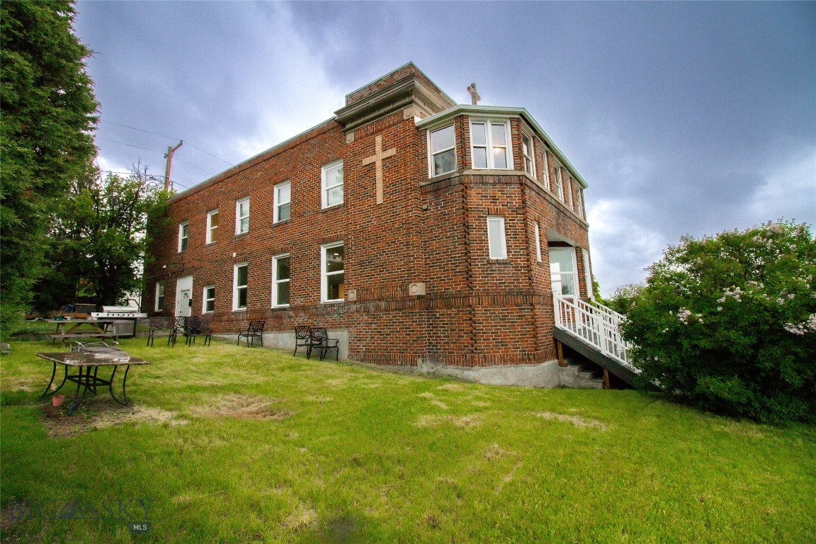 Welcome to The Convent. This historic piece of Butte’s history has been transformed into a
magnificent residence merging the beauty of a brick structure with the modern convenience of
updated infrastructure, all embracing spectacular unobstructed views of uptown Butte, the flat,
and the Highlands. Also perfect for watch the majestic firework display on the 3 rd of July.
Built in 1917, the all brick structure features completely upgraded plumbing and electrical. The
over 6,000 square feet of living space boasts some of the best views in Big Sky Country
It comes complete with 5 bedrooms, 5 1/2 baths, 2 sun porches, large open kitchen for all your entertaining needs, wood fireplace, wine room, sauna, basement area is currently a great work out room
The home has been beautifully and tastefully renovated and is ready for someone who wants to
enjoy it as much as the current owners have cherished it. This is a dream property, and you can
make it yours.