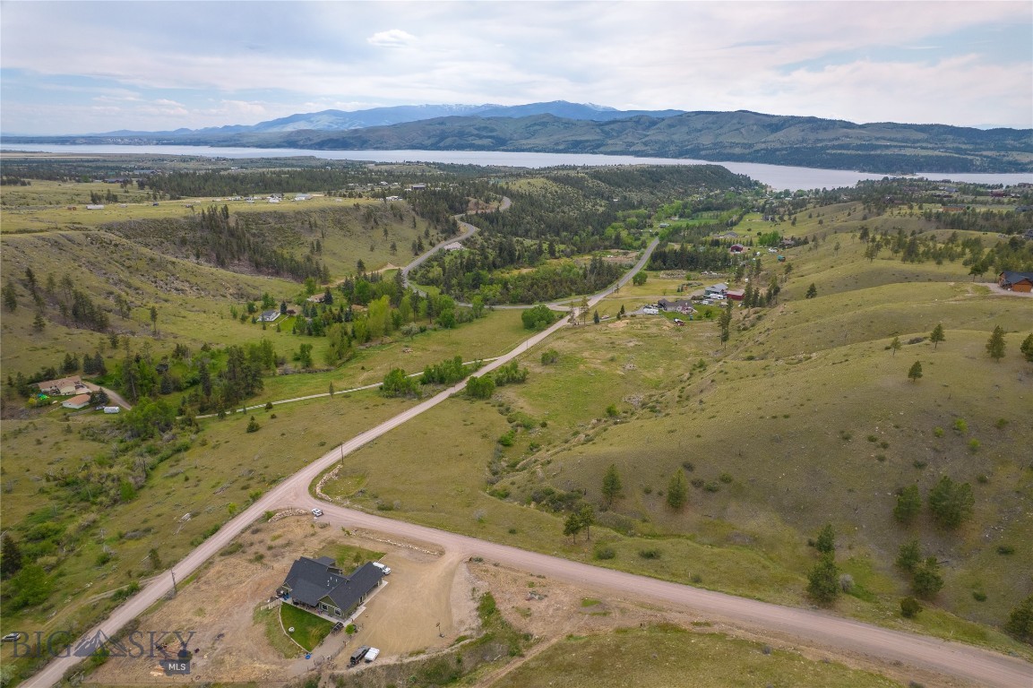 Some properties ask you to compromise.

This one quietly asks a different question:
What would your life look like if the lake was part of your normal routine instead of a weekend production?

8585 Eagle View Lane offers 5 acres just minutes from Canyon Ferry and Kim’s Marina, giving you room to build the Montana setup most people spend years talking about.

A custom home with views.
A shop big enough for the boat, side by sides, and lake gear.
Space for summer evenings outside instead of packed campgrounds and crowded storage lots.

This property sits in an established community with maintained roads and covenants designed to help protect long term property values, while still offering the elbow room and lifestyle that draws people to Montana in the first place.

Because for many buyers, luxury starts looking a lot less like excess and a lot more like convenience.

Boat launches that are actually close.
A garage that finally fits your hobbies.
Coffee before the lake.
Bonfires after.
Friends staying too late on the patio because nobody wants to leave.

And unlike many land listings that sell a fantasy disconnected from reality, this location actually supports the lifestyle people imagine when they say they want “more space” and “more Montana.”

Build the house.
Build the shop.
Build the weekend routine you keep saying you’ll get around to someday.