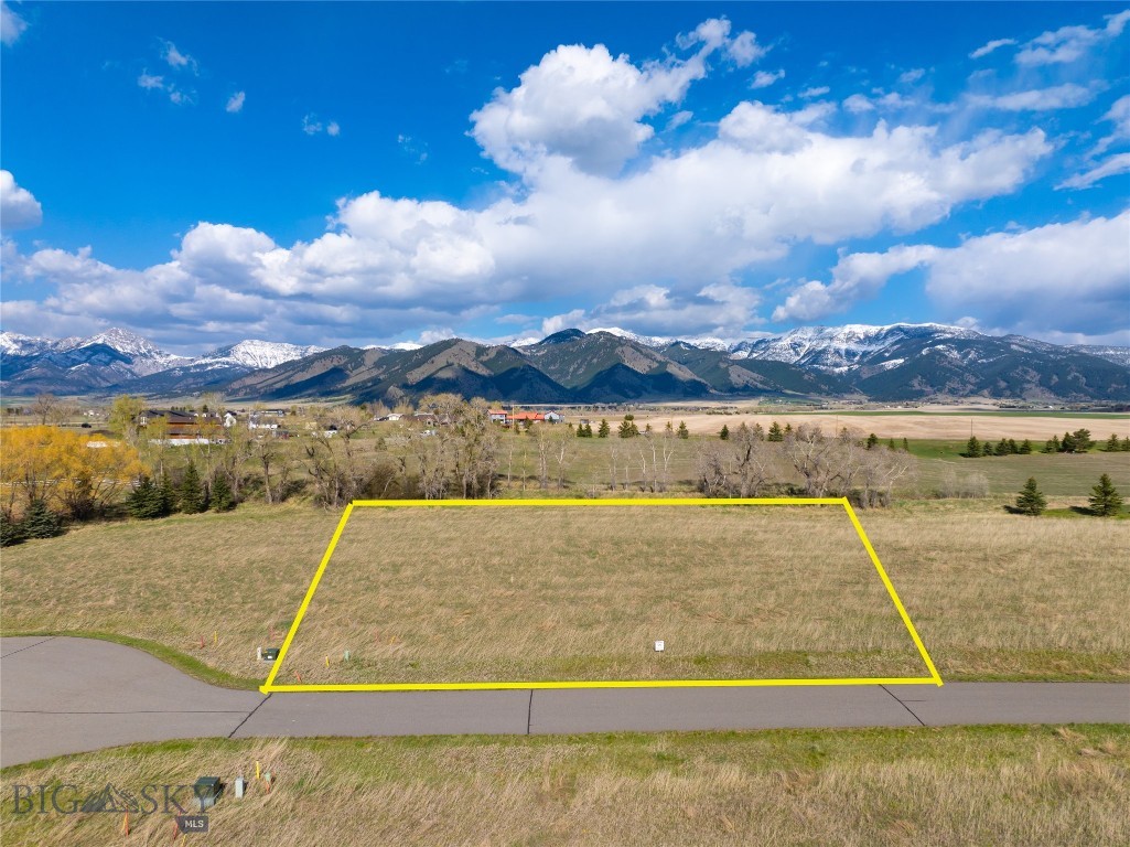 Tucked away at the end of a quiet cul-de-sac on Wavy Leaf Lane, this 1.028-acre homesite in Bridger Lake Meadows captures everything buyers love about Montana living — privacy, scenery, and sunshine. Backed by a graceful stand of mature cottonwoods and no planned development behind the property, the setting feels open, protected, and serene.

Enjoy unobstructed southern exposure that floods your future home with natural light while framing dramatic views of the Bridger Range, Spanish Peaks, and Tobacco Root Mountains. It’s one of the few parcels that offers a perfect combination of sheltered privacy and panoramic vistas.

Residents of Bridger Lake Meadows enjoy private access to the East Gallatin River and a stocked community lake, along with a 28±-acre nature park and 130 acres of open space ideal for walking, wildlife viewing, and relaxation. The neighborhood’s paved roads, thoughtful design standards, and preserved natural corridors create an enduring sense of quality and harmony.

Located just 10 minutes from downtown Bozeman and 12 minutes from Yellowstone International Airport, this property offers unmatched tranquility without sacrificing convenience.

Bring your vision and build your Montana dream home on one of the most desirable and private lots in Bridger Lake Meadows — where sunlight, space, and mountain views define everyday living.