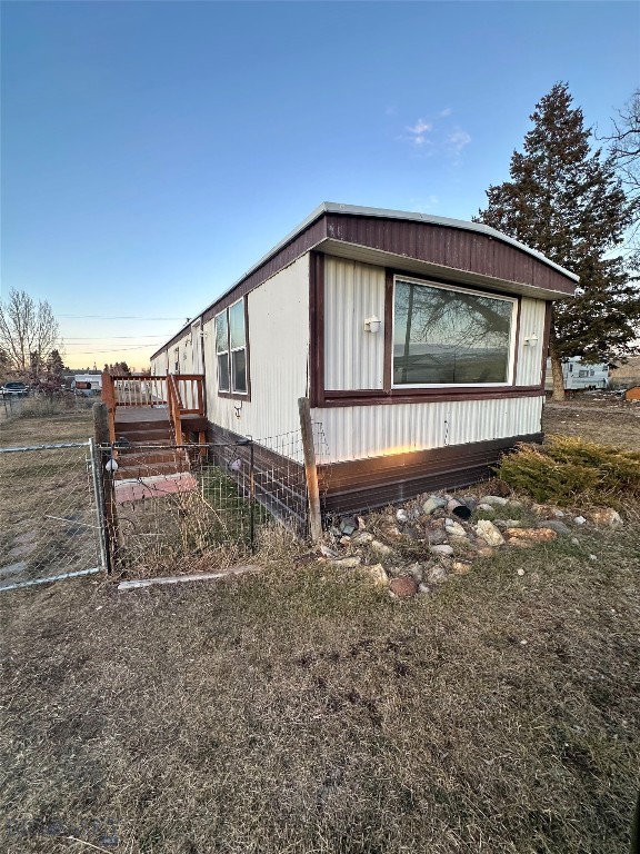 Well-maintained and fully remodeled 2 bed, 1 bath mobile home situated on a spacious 13,000 sq ft lot. This property features updated finishes throughout, a bonus room offering flexible use for an office, storage, or additional living space, and off-street parking. The home is equipped with a durable rubberized roof for added longevity. With a strong rental history, this is a solid investment opportunity, while the large lot provides potential for future expansion or additional improvements.