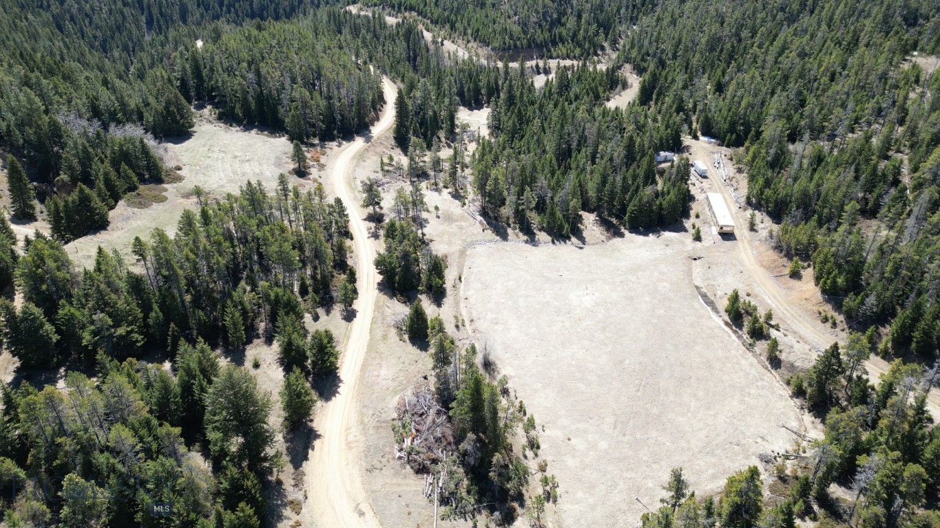 Located in the heart of the Judith Mountains, Parcel C offers a recreational and accessible piece of Montana hunting land within the renowned Game Management Unit 412. This acreage stands out with direct frontage along Maiden Road and the rare advantage of owning land on both sides of the road.

The property features multiple natural draws extending across both sides of the road, creating ideal terrain for wildlife movement and bedding. Seasonal water flows through these draws, while Maiden Creek runs through the lower portion, offering a reliable water source that enhances habitat for elk, deer, bear, moose, and mountain lions known to frequent the area.

A private gated entrance directly off Judith Peak Road ensures secure and convenient access, making this parcel especially attractive for those seeking a balance of seclusion and usability.

The mix of timbered cover and open corridors in this area provides excellent hunting setups, natural travel routes, and opportunities for recreational use throughout the property.

Steeped in Montana history, this parcel is part of historic mining claims dating back to the early 1900s, with no active operations since before World War II. Today, it offers a unique blend of legacy character and modern-day potential. With no improvements in place, Lot C is a blank slate ideal for a hunting basecamp, or long-term investment.

Property Highlights

Two water rights to Maiden Creek
Located in GMU 412 - premier hunting district
Maiden Road frontage with land on both sides
Private gated access off Judith Peak Road
Maiden Creek running through lower draw
Multiple draws with seasonal water flow
Elk, deer, bear, moose, and mountain lion habitat
Timber + open terrain mix
Historic mining claims (early 1900s, inactive)
No improvements - blank slate opportunity
Strong hunting, recreational, and investment appeal
Maps & Videos
