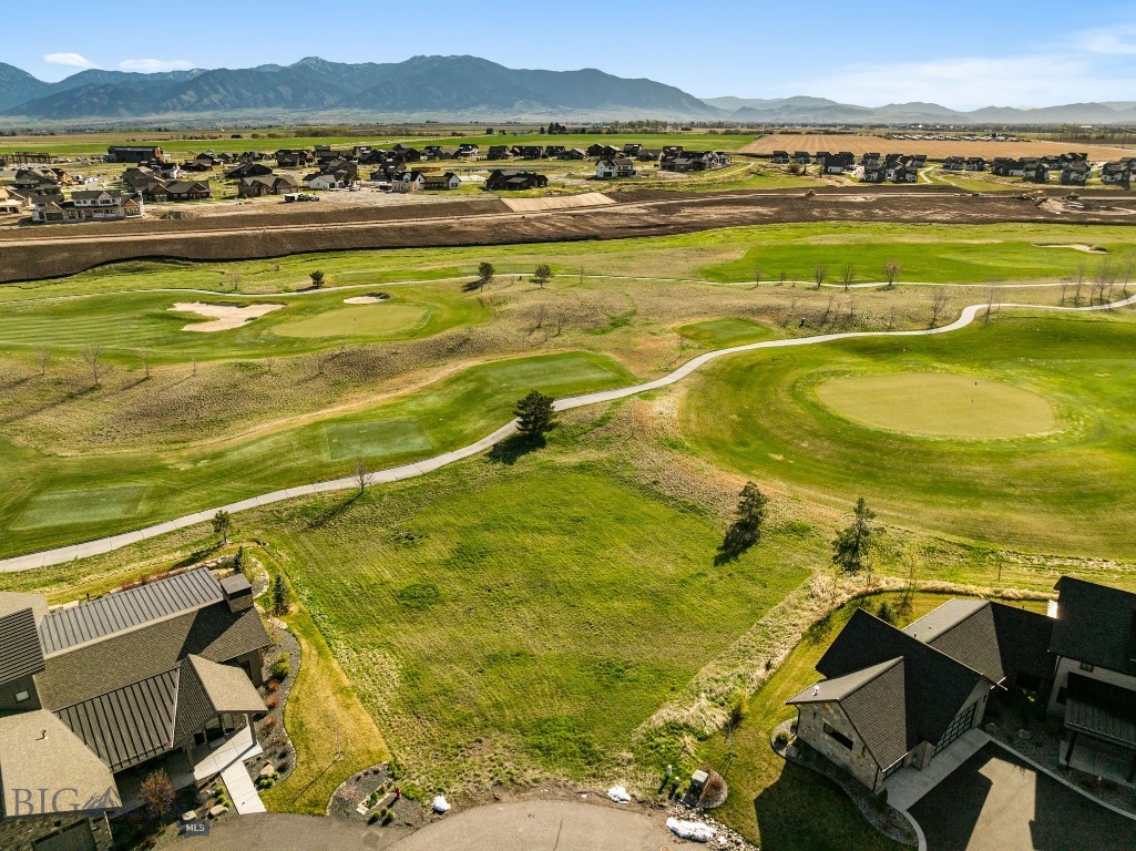 Imagine waking up to the glow of Montana’s sun, next to the fairways of the renowned Black Bull Golf Community. This .425-acre slice of paradise sits right between the 12th green and the 13th tee, where every day feels like a golfer’s dream come true! Enjoy cross-country skiing when the snow has fallen and the golf course becomes a winter trail.  With scenic Bridger Mountain views and an almost level parcel, your vision for an extraordinary home can spring to life.  When you’re not on the course, the community offers a clubhouse with a bar, restaurant, social events, outdoor pool, and fitness center.  Social Membership is required, and upgrading adds golf privileges for unlimited play. There’s something here for everyone to enjoy, whether you want to stay active or simply relax and connect.  Adventure surrounds you: downtown Bozeman is just 10 miles away, Bridger Bowl Ski Area is 23 miles, Big Sky Town Center is 42 miles, Big Sky Ski Resort awaits at 48 miles, and West Yellowstone is within reach at 87 miles. Whether you’re seeking entry into the community or your forever home location, this property is your gateway to Montana’s best golf, recreation, and breathtaking beauty. Don’t just dream, live it.