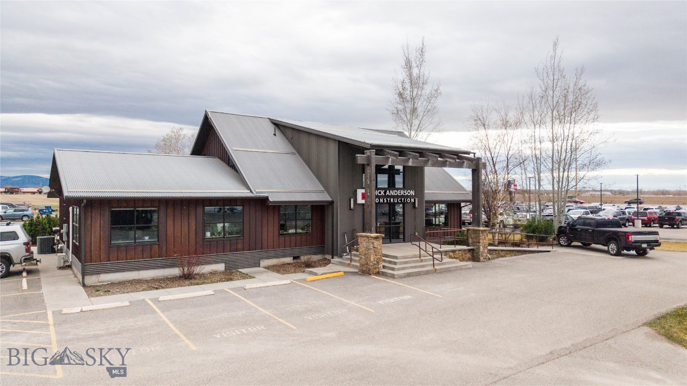 Modern flex commercial building with strong Jackrabbit presence in a high-traffic industrial corridor. Constructed with quality materials and well maintained. 

The versatile layout is ideal for retail, showroom, office, light industrial, or service-based businesses. Features include high ceilings, ample natural light, ADA-compliant access, and flexible floor plans that can accommodate a variety of uses. Main floor includes five private offices, full kitchen, large conference room, waiting area and open work area. Upstairs includes open work area and four private offices. 

Excellent visibility and signage opportunities with easy access for customers, employees, and deliveries. Generous parking and convenient access to major transportation routes make this a prime location for tenants seeking a professional, modern commercial space in a busy industrial area.
