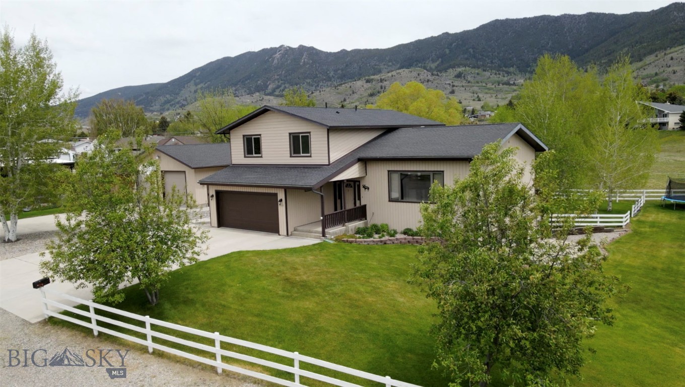 .Rare find in Butte! This expansive 3,600 sq ft, 3-level home sits on a premium 1.02-acre city lot, blending total convenience with room to breathe.
The Layout: Built for space and versatility, featuring 5 bedrooms, 3.5 bathrooms, and three distinct living areas spread across three levels.
The Walkout Suite: The fully finished lower level features a premier walk-out second primary suite / mother-in-law quarters. This versatile level is fully equipped with its own spacious family room (the third living area), a large bedroom, a dedicated walk-in closet, and an entirely independent private laundry room—making it an ideal setup for multi-generational living or guests.
The Outdoors: Unwind on the durable Trex back deck to panoramic views of the East Ridge and Highlands. The property features an attached double garage, a full RV hookup with a septic dump, a backyard greenhouse, full underground sprinklers, and its own private well.
The Showstopper: A detached, oversized, 220-volt heated workshop ready for all your tools, projects, and Montana toys!