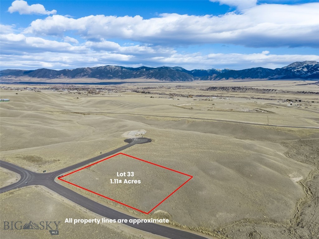 Lot 33 offers 1.11± acres within a thoughtfully planned 55-lot community, with parcels ranging from approximately 1 to 2 acres. The subdivision spans 165± acres total, providing generous open space and excellent opportunities to enjoy local wildlife. Paved roads are in place, with mailboxes, power, and fiber optic service to each lot. Located approximately three miles from downtown Ennis, this property offers sweeping views in all directions and convenient access to town amenities. Wells throughout the subdivision range from approximately 200 to 350 feet in depth, producing 12 to 60± GPM. The licensed Montana listing agent is a member of the selling entity & can only represent the seller.