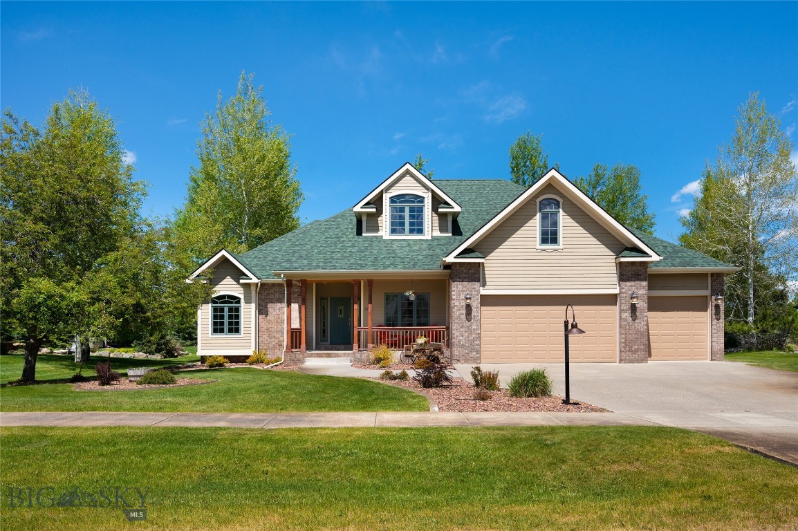 Few addresses in Bozeman carry the quiet prestige of Sundance Springs, and this 4-bedroom, 2.5-bath home represents one of the neighborhood's finest offerings — a thoughtfully crafted 2,660 sq ft residence where refined comfort meets the very best of Montana living. The main level is designed for the way life is actually lived. A coveted main-floor primary suite anchors the layout, offering the flexibility of single-level living without sacrificing space or style. A dedicated dining room sets the scene for evening gatherings, while the living room makes a statement all its own — soaring vaulted ceilings draw the eye upward while floor-to-ceiling windows flood the space with natural light & frame the lush surroundings like a living painting. A cozy fireplace nestles at the transition between the living room & kitchen, softening the boundary between the two spaces & lending a warmth that makes the entire main level feel like home. The kitchen is positioned at the heart of it all, designed for connection as much as cooking, and a main-floor laundry room keeps daily routines effortlessly in check. A convenient half bath completes the level with grace & privacy. Upstairs, the layout offers a flexibility that is increasingly hard to find. Configure the space as (3) bedrooms & a full bath, or reimagine it as (2) generously sized bedrooms paired with a large bonus room — a home office, media room, playroom, or gym, depending on Your needs. It's a rare adaptability that allows the home to grow & shift with you over time. The outdoor living experience here is nothing short of exceptional. Step from the main level onto a generous back deck perfectly suited for al fresco dining, morning coffee, or simply taking in the scenery. Below, a spacious and beautifully maintained yard — kept lush year-round by the property's own private well — unfolds toward a pristine open space backdrop that ensures the views & privacy. The attached 3-car garage provides abundant room for vehicles, mountain bikes, skis, and every piece of gear that comes with life in Montana. Beyond your doorstep, Sundance Springs delivers a neighborhood experience that is genuinely rare: walking trails that wind past a tranquil community pond, mature tree canopy, and a connected trail system ideal for morning runs or sunset rides. All of this, just minutes from downtown Bozeman's thriving restaurant and arts scene, MSU, and world-class outdoor recreation in every direction.