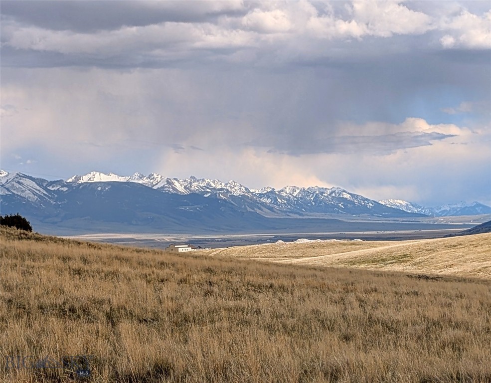 Lot 193A Hilltop Trail – Shining Mountains I | 5.144 Acres | $175,000 Perched in an elevated position on Hilltop Trail, this 5.144-acre lot in Shining Mountains I offers breathtaking views down the Madison Mountain Range and across the Madison Valley. The property provides the perfect setting for a mountain retreat or year-round home, with open build sites and dramatic big-sky vistas. Located just off the county maintained road and 10 miles south of Ennis, the lot offers easy access to world-class fishing on the Madison River, public lands, and the abundant recreational opportunities that make Southwest Montana so desirable. Power is close by and fiber optic communication lines are to the property, making it ready for your vision. Priced below recent appraised value. Whether you're seeking privacy, stunning scenery, or proximity to Montana's outdoor lifestyle, this lot delivers.