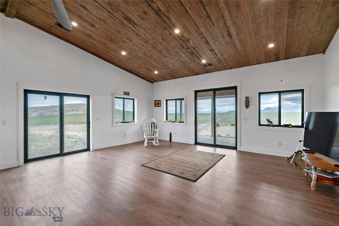 5 ACRES !!! This 3-bedroom, 2-bathroom home delivers 1,800 square feet of well-crafted living space in a setting that captures Montana's wide-open landscape. Built with quality materials and careful attention to detail, this property stands out for its combination of solid construction, generous land, and a location that balances rural tranquility with everyday convenience.

Step inside and you'll notice the character right away. Barn wood doors add rustic appeal throughout the home, while a wood-paneled ceiling brings natural warmth to the living spaces. Abundant windows fill the rooms with natural light, creating a bright and welcoming feel. The master suite features its own private bathroom, offering a comfortable personal place to get ready for the day ahead. A 2-car garage provides ample room for vehicles, gear, and weekend projects.
The generous 5 acre lot provides sweeping views and ample room for outdoor living, gardening, or simply soaking in the tranquil surroundings. Equestrian enthusiasts will appreciate that two horses are permitted, making this an ideal setting for those who dream of a countryside lifestyle with room to roam.

Nestled right outside the charming town of Three Forks, residents enjoy close proximity to Three Forks schools, convenient access to Belgrade, and a manageable drive to Bozeman Yellowstone International Airport for travel needs. The vibrant culture and amenities of Bozeman are also within easy reach.
Schedule your private showing today.
