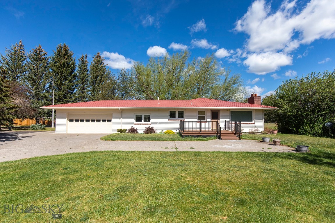 Montana living at its best — this single-level home sits on just over an acre with sweeping mountain views and the kind of peace and space that make Livingston so special. And for outdoor enthusiasts, it’s hard to beat being close to the Yellowstone River, perfect for those spontaneous fishing trips or quiet evenings by the water.

Inside, the home offers warm, inviting comfort with real wood floors, a gas fireplace for those winter nights.. The layout is easy and accessible, with natural light pouring in and views that never get old.

Step outside to a property designed for both relaxation and utility. The front deck is a favorite spot for summer nights — whether you’re watching the sunset or enjoying a quiet moment under Montana’s big sky. Out back, a large shop provides excellent space for extra vehicles, a woodworking setup, hobby projects, or generous storage. A durable metal roof adds long-term peace of mind.