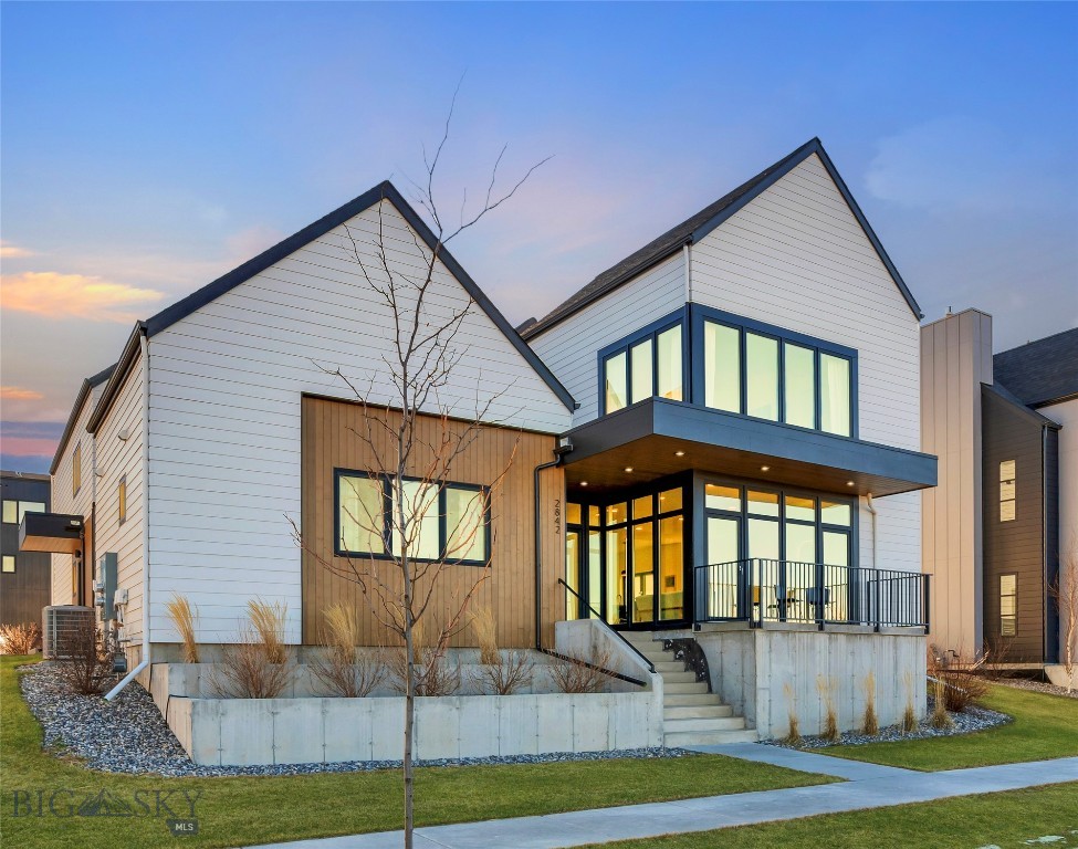 A rare opportunity in Gran Cielo, this striking modern home combines thoughtful design, flexible living, and iconic Bridger Mountain views. Floor-to-ceiling glass frames a direct view of the “M” while overlooking 4+ acres of park space—offering a sense of openness that’s hard to find in Bozeman.

The layout is both functional and versatile, featuring 4 bedrooms, 3.5 baths, two primary suites, and a spacious main-level bonus room ideal for an office, gym, or second living area. The upstairs primary suite is a true retreat with vaulted ceilings, a generous walk-in closet, and a full wall of windows capturing Montana’s natural light.

An attached 847± sq ft ADU with private entrance adds exceptional value and flexibility—perfect for rental income, extended guests, or multigenerational living. The ADU includes its own kitchen, laundry, and full set of appliances.

Located in one of Bozeman’s most sought-after communities with easy access to MSU, trails, downtown, and everyday amenities, this home offers a unique combination of lifestyle, design, and long-term value.

Homes with this level of flexibility, views, and location are limited—schedule your showing today.