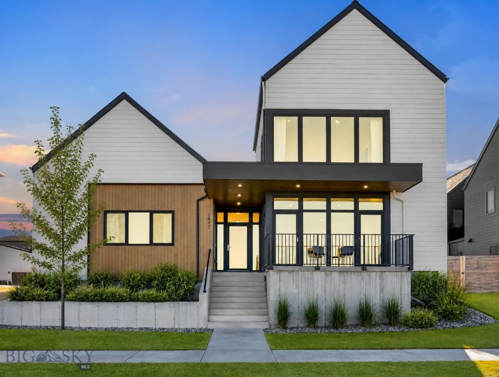 A rare opportunity in Gran Cielo, this striking modern home combines iconic Bridger Mountain views, flexible living, and an unbeatable South Bozeman location. Floor-to-ceiling glass frames a direct view of the “M” while overlooking more than 4 acres of park space, creating a sense of openness rarely found in town.

Designed for today's lifestyle, the home features 4 bedrooms, 3.5 baths, two primary suites, and a spacious bonus room ideal for an office, gym, or second living area. The upstairs primary suite offers vaulted ceilings, a large walk-in closet, and expansive windows that capture Montana's natural beauty.

Adding exceptional value is the attached 847± sq. ft. ADU with a private entrance, full kitchen, laundry, and complete appliance package—perfect for rental income, guests, or multigenerational living.

Located just minutes from MSU, trails, downtown Bozeman, and everyday amenities, this home offers a rare combination of views, versatility, and long-term value in one of Bozeman's most sought-after communities. Homes with this level of flexibility and protected park-front setting are rarely available. Some photos are virtually staged and/or enhanced.