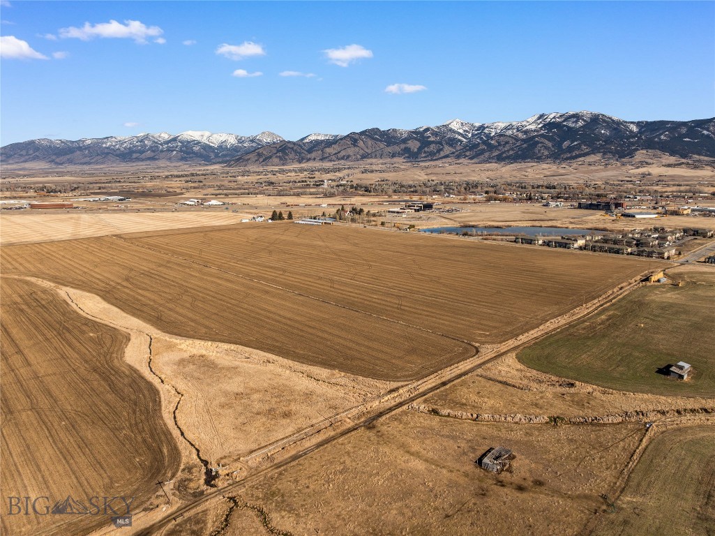 Development opportunity in great location. Zoned REMU offers many options for high density residential with a neighborhood commercial component. No water rights convey with the property. Buyer is responsible utilities and water/sewer. PRIOR TO CLOSING, SELLER WILL HAVE A NEW PLAT RECORDED FOR A LOT LINE RE-ADJUSTMENT WHICH WILL CHANGE THE ACERAGE OF THE SUBJECT PROPERTY TO APPROXOMATELY 56 ACRES +/-. Some photos show approximate boundaries, the boundary to be finalized prior to closing. All information is deemed reliable but not guaranteed. Buyers and buyer agents to verify all information.