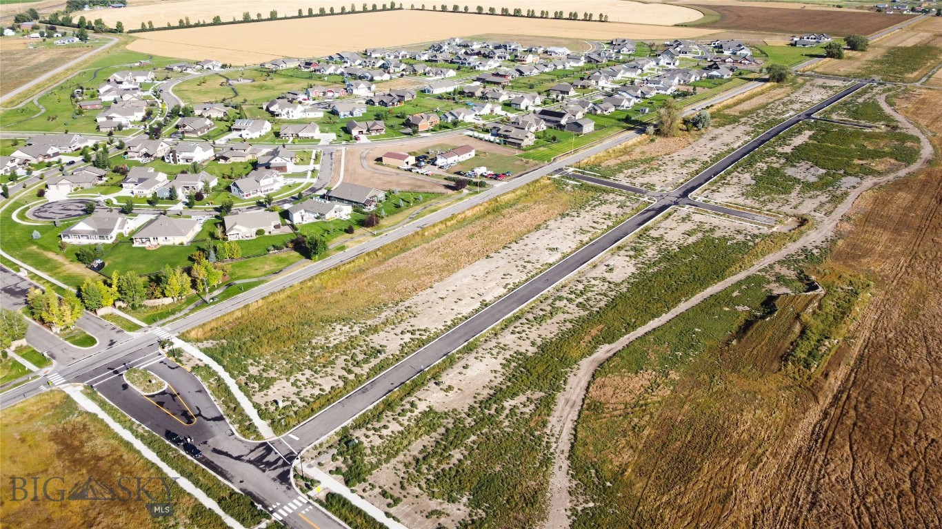 Welcome to Lot 8, Block 2 in Manhattan Meadows, the largest, premier ADU homesite offering the perfect blend of space, scenery, and small-town Montana charm. Set within one of Manhattan’s newest subdivisions, this spacious lot provides the ideal foundation for your custom home—whether you’re dreaming of modern farmhouse, traditional ranch, or a contemporary Montana design. Enjoy wide-open Bridger views and the peaceful setting that Manhattan is known for. With level terrain and convenient utility access, this lot is truly build-ready. Manhattan Meadows offers a thoughtful neighborhood layout, paved roads, and easy access to schools, dining, and the local grocery while still being only minutes from I-90 for quick trips to Bozeman, the airport, or outdoor recreation.