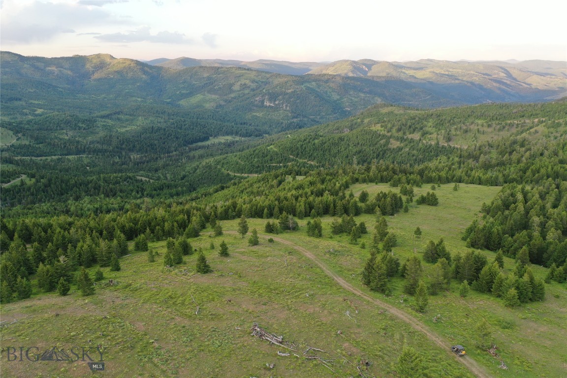 156.65+/- acres –Near Drummond Discover your own private slice of Montana, nestled in the scenic Garnet Mountain Range. Surrounded by mountain views, open meadows, sloped terrain, and expansive acreage, this property offers the perfect setting for those seeking a secluded getaway, seasonal homestead land, recreational retreat, or wildlife haven. Whether you're looking to buy land in Montana for recreation, investment, or to build your off-grid cabin, this rural property checks all the boxes. It’s also ATV-friendly, making it easy to explore the land and enjoy the rugged Montana terrain. Watch elk, deer, and other native species roam freely across your private acreage—making it a prime option for hunting land for sale in Montana. The property offers seasonal gravel road access and has no known covenants. Don’t miss your chance to own a piece of Montana mountain land—your personal seasonal recreational retreat.